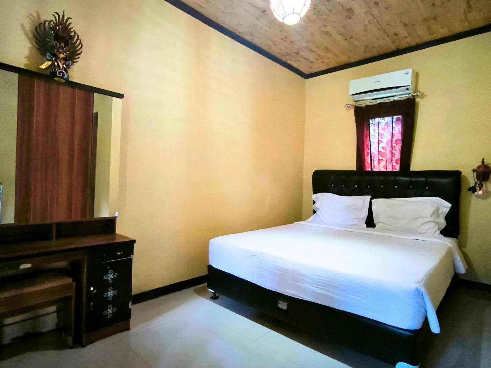 Bed in Villa Setumbu powered by Cocotel