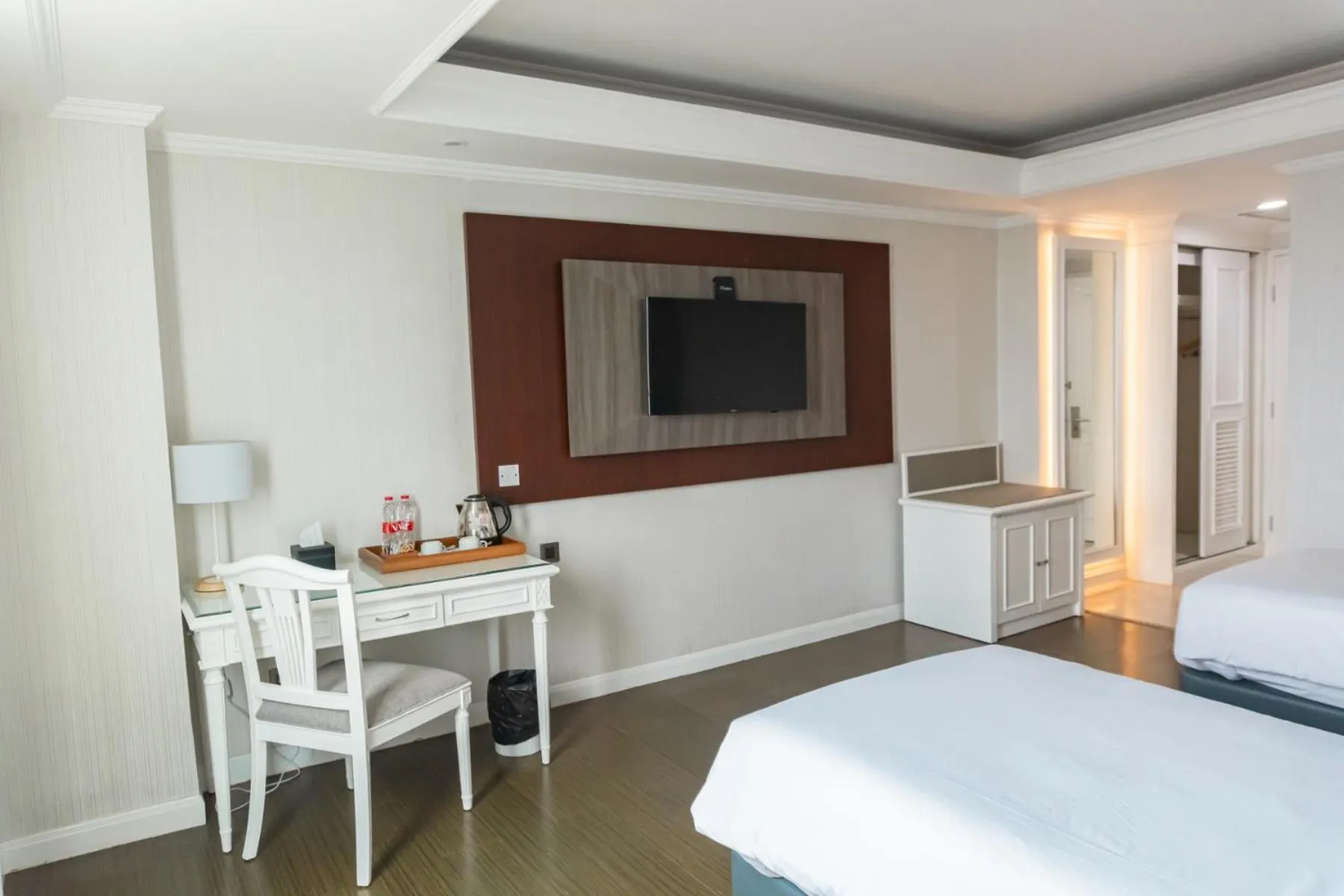 Communal lounge/ TV room, Bed in Tavia Heritage Hotel