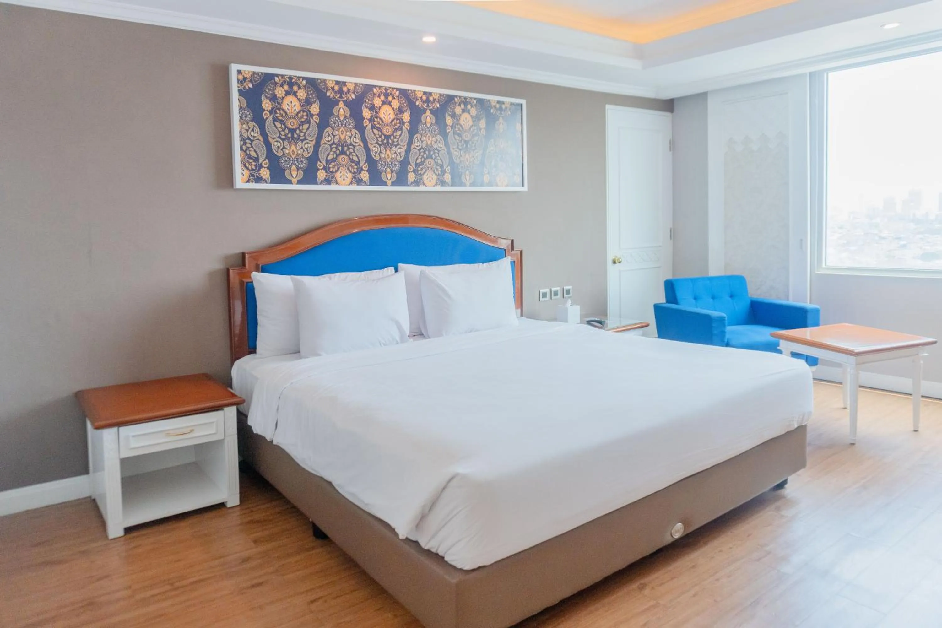 Bed in Tavia Heritage Hotel