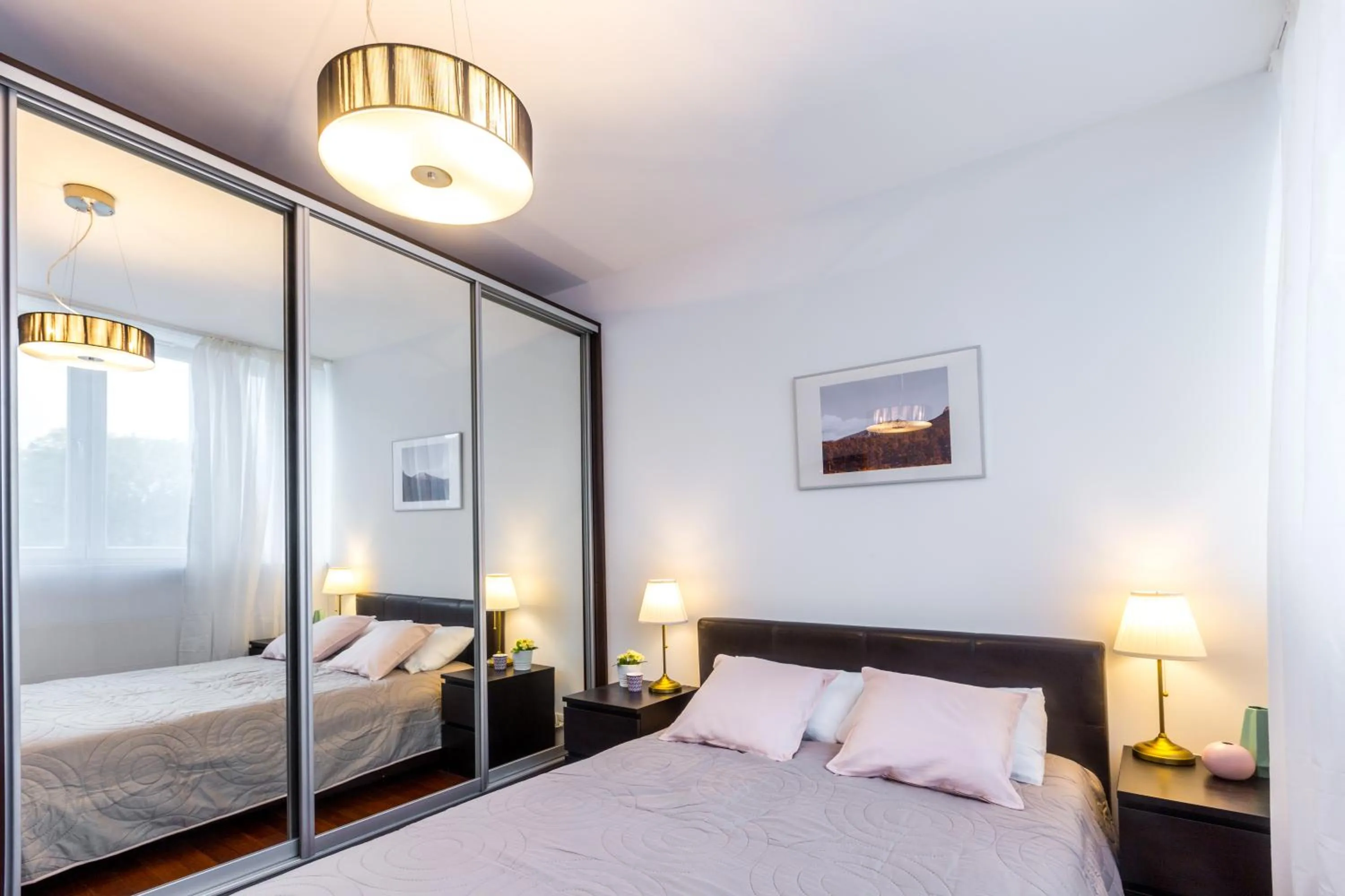 wardrobe, Bed in Wonderful Apartments in the Center of Krakow