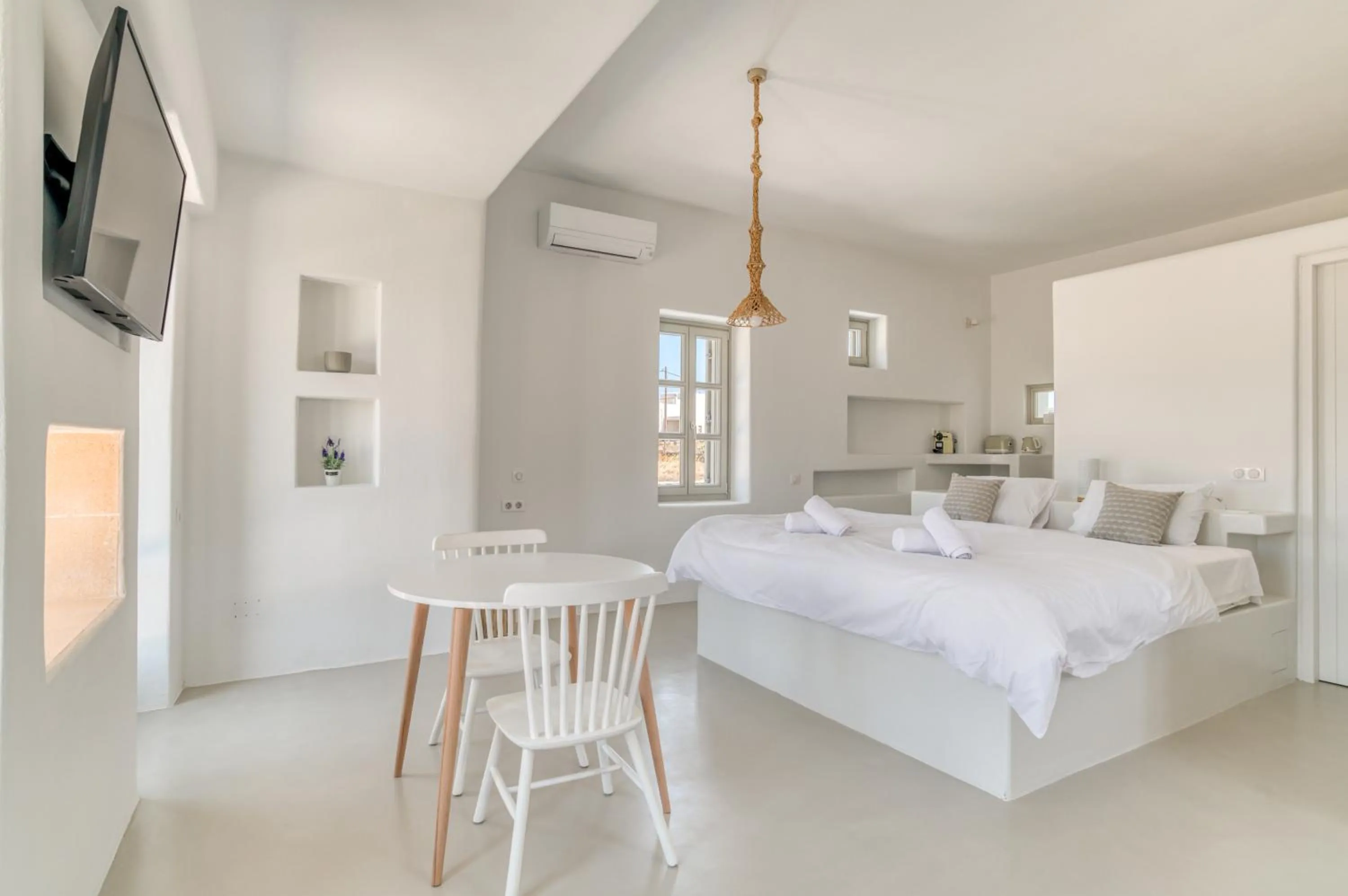 Bed in Lil Paros Luxury suites