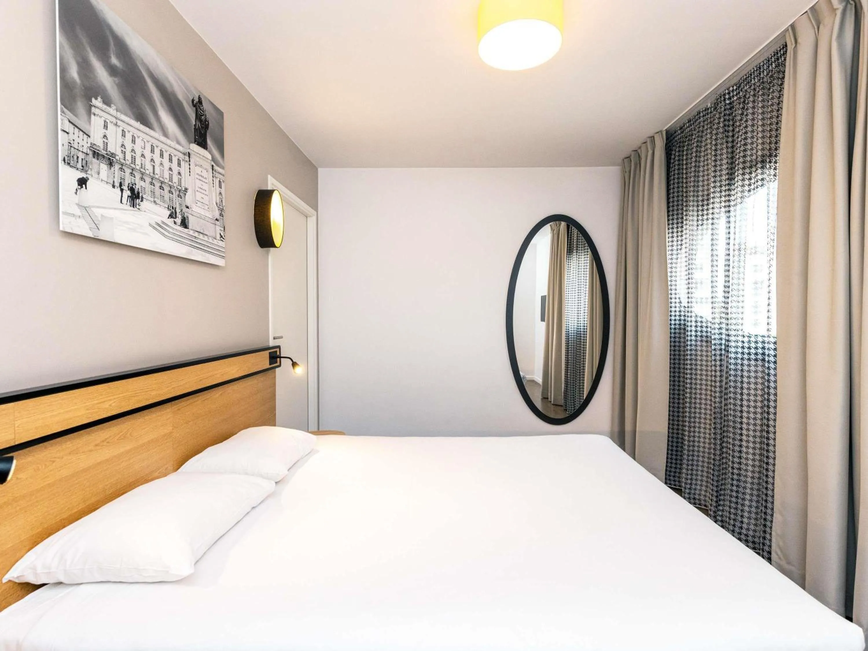 Bedroom, Bed in Aparthotel Adagio Access Nancy Centre