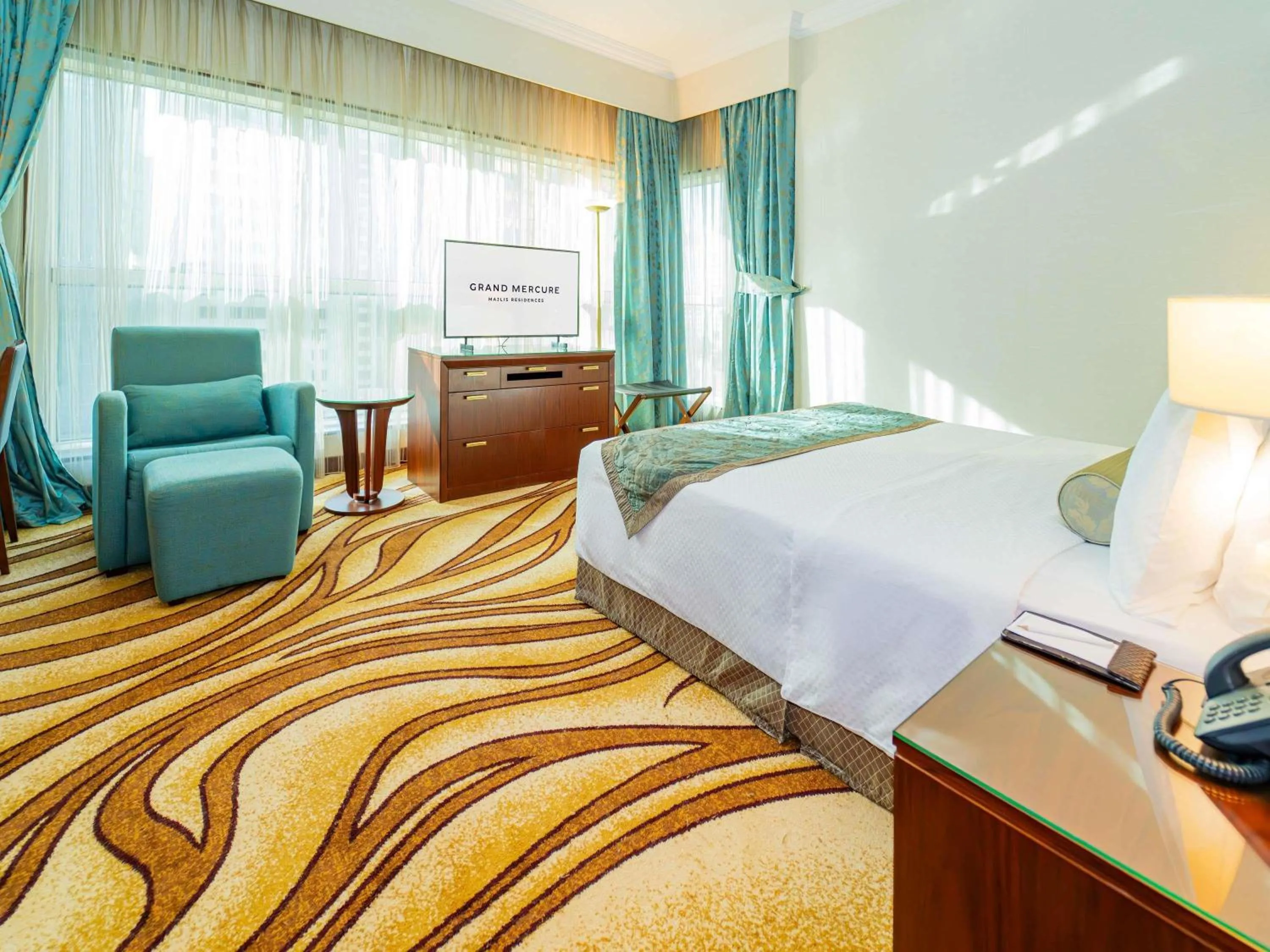 Bedroom, Bed in Grand Mercure Majlis Residences Abu Dhabi