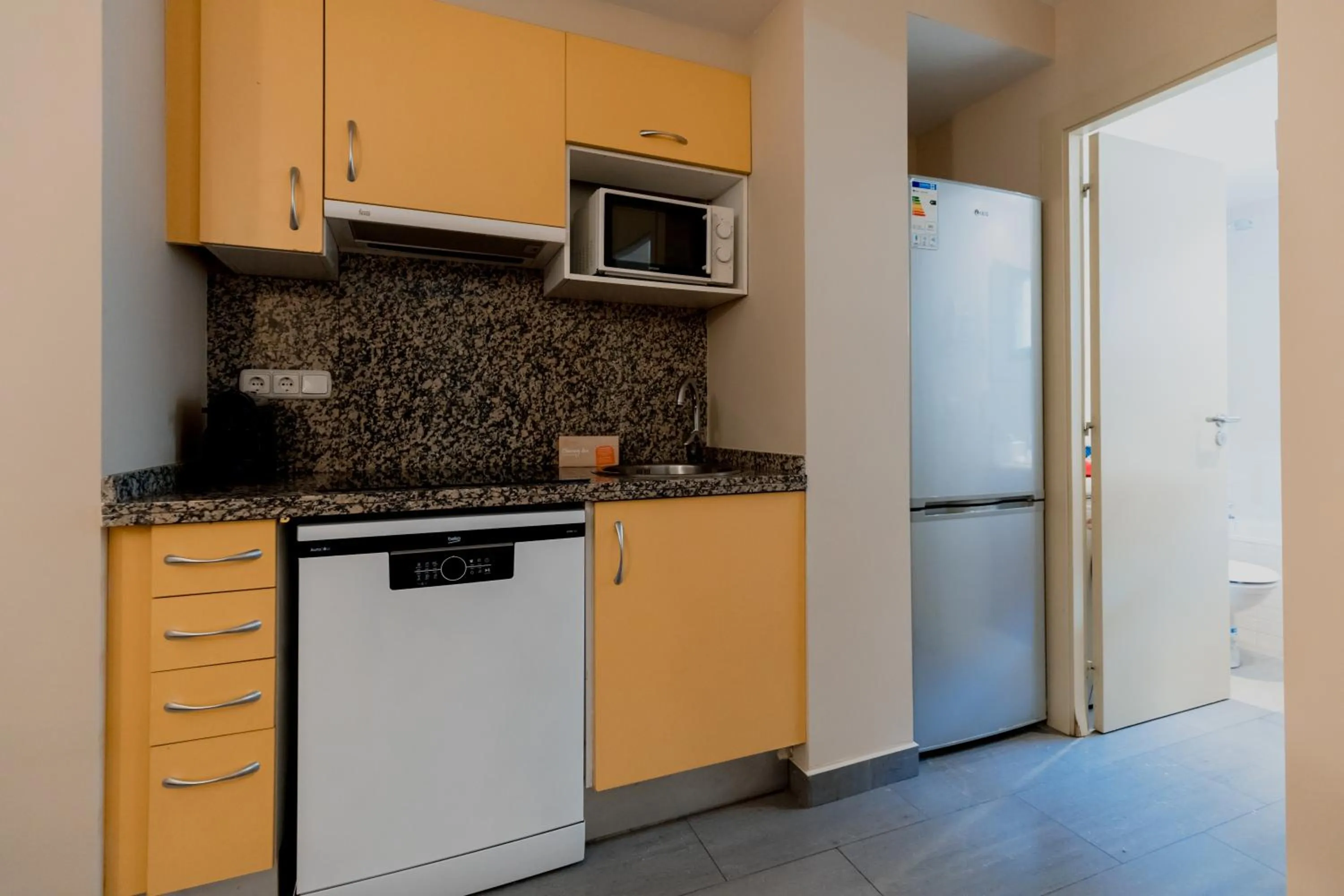 Kitchen or kitchenette in Pierre & Vacances La Merceria