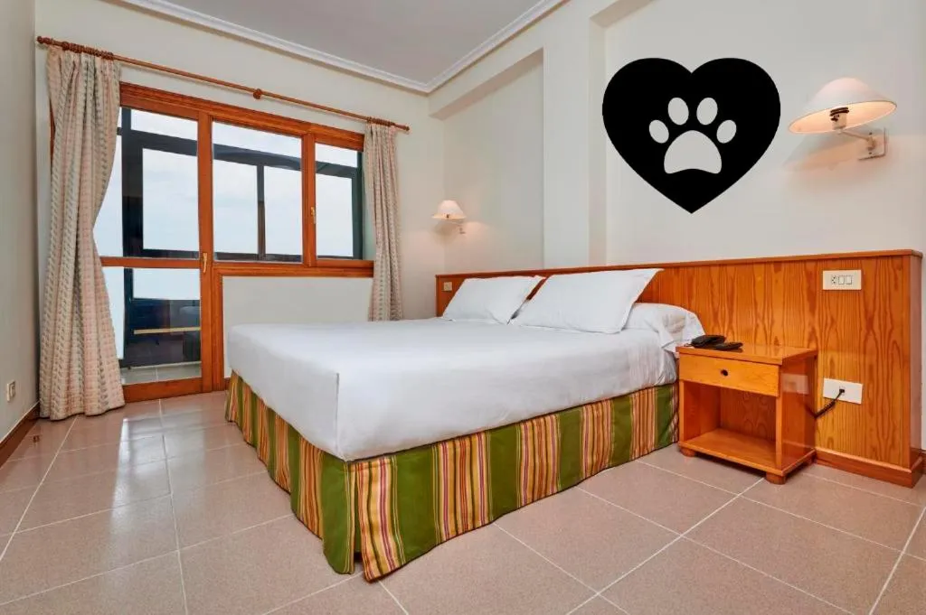 Bed in Hotel Juan de la Cosa