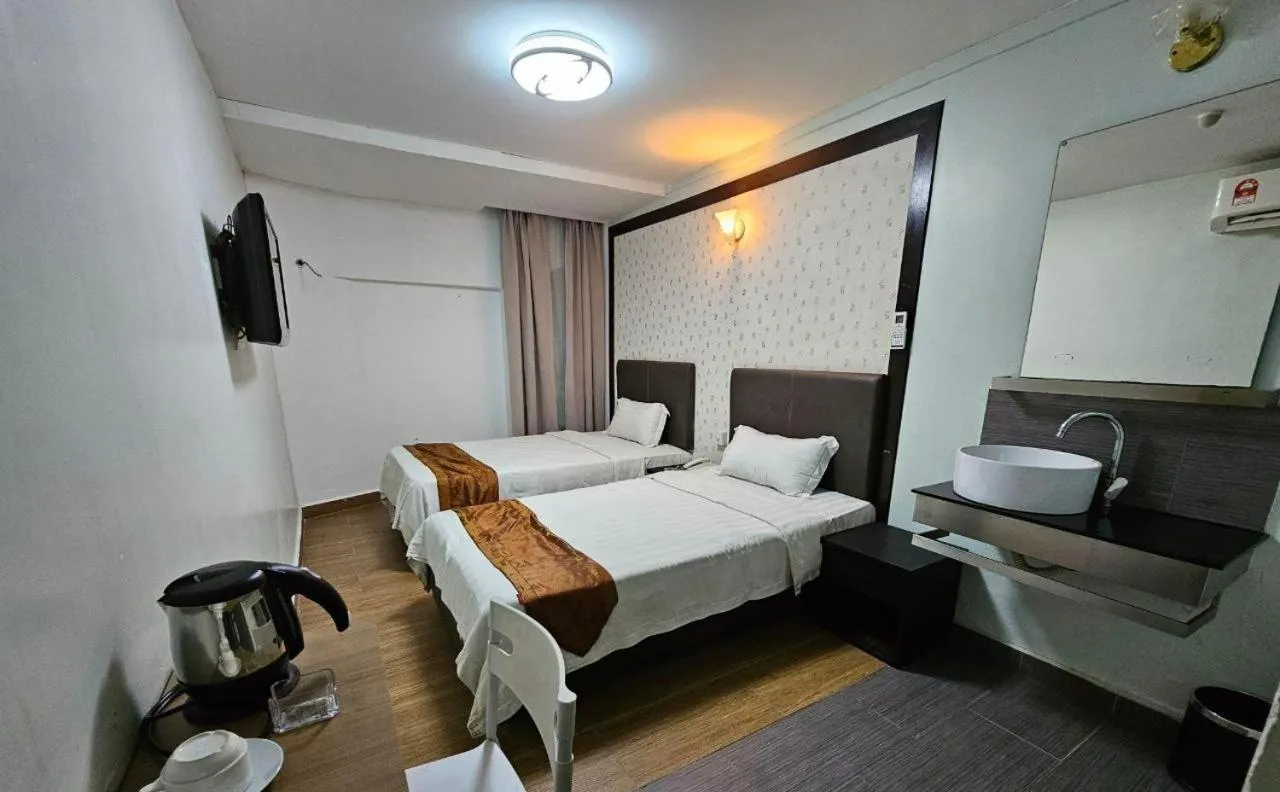 Bed in Warisan Hotel Kota Kinabalu