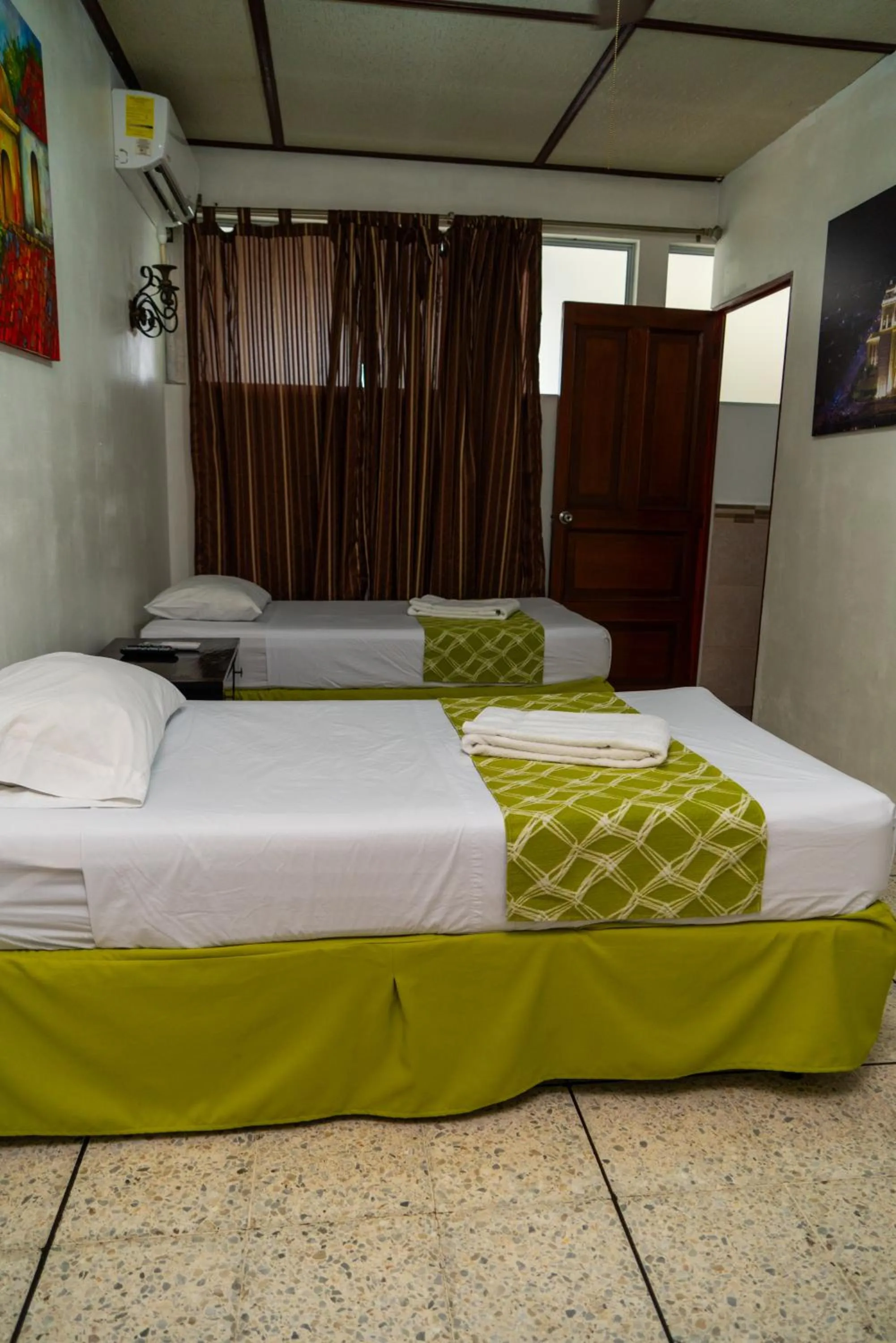Bedroom, Bed in Suites & Apartments San Benito - Zona Rosa