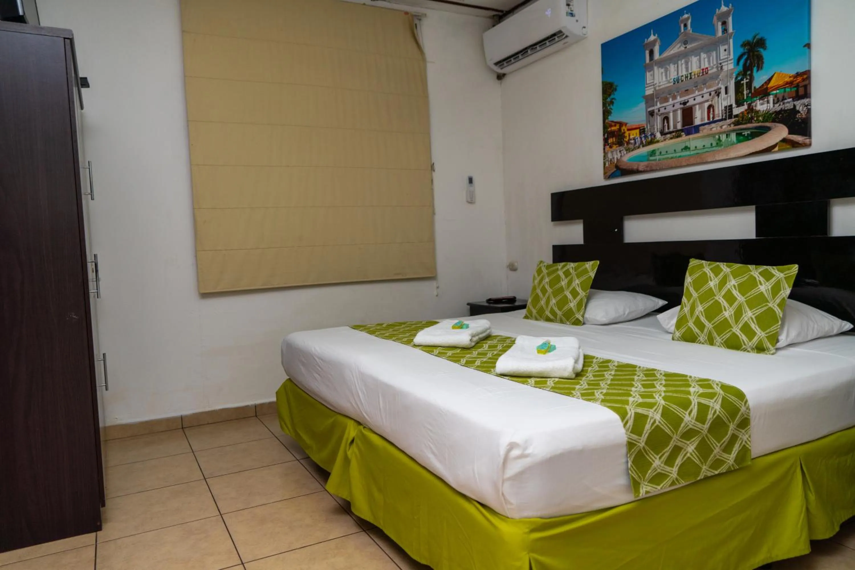 Bedroom, Bed in Suites & Apartments San Benito - Zona Rosa