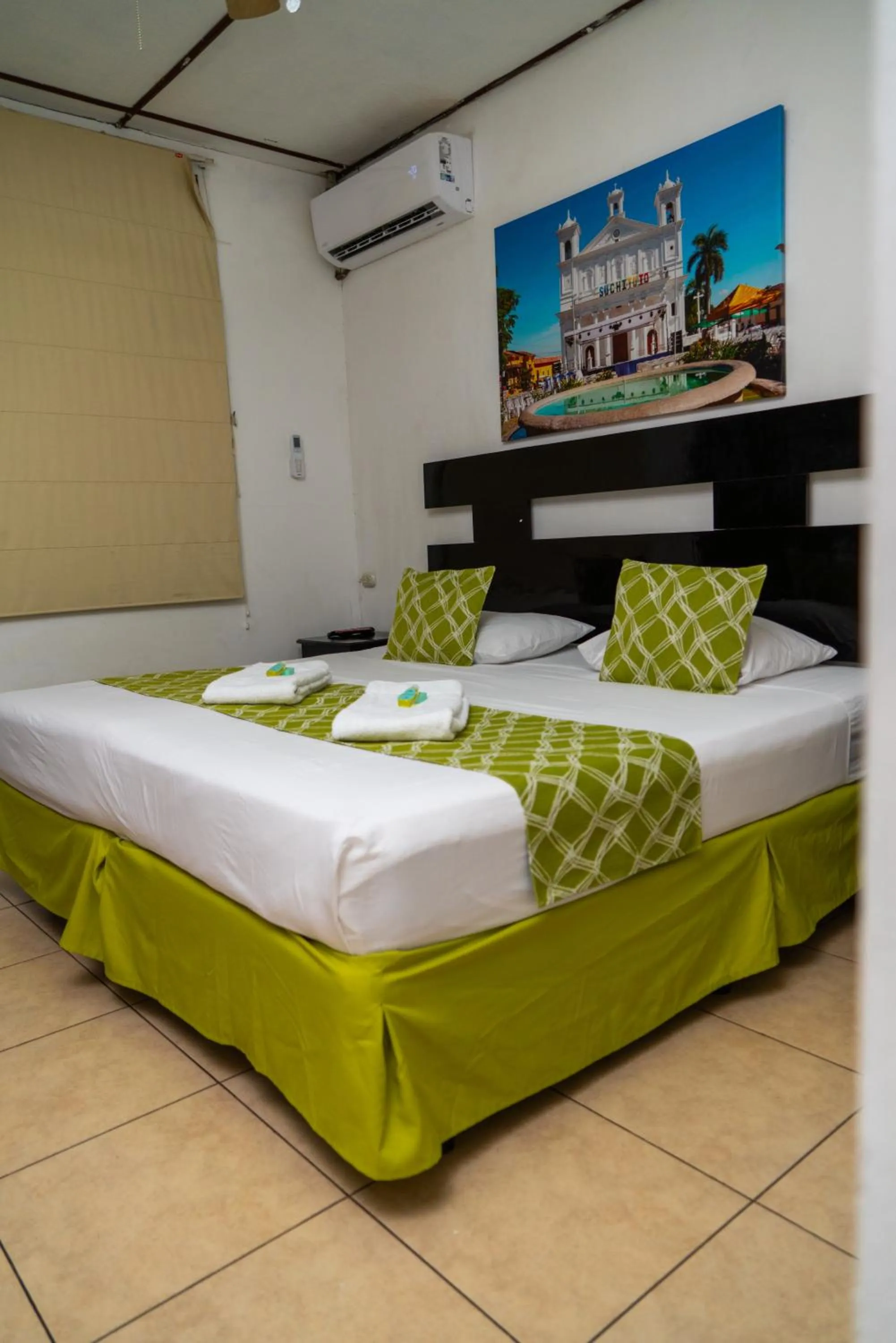 Bedroom, Bed in Suites & Apartments San Benito - Zona Rosa