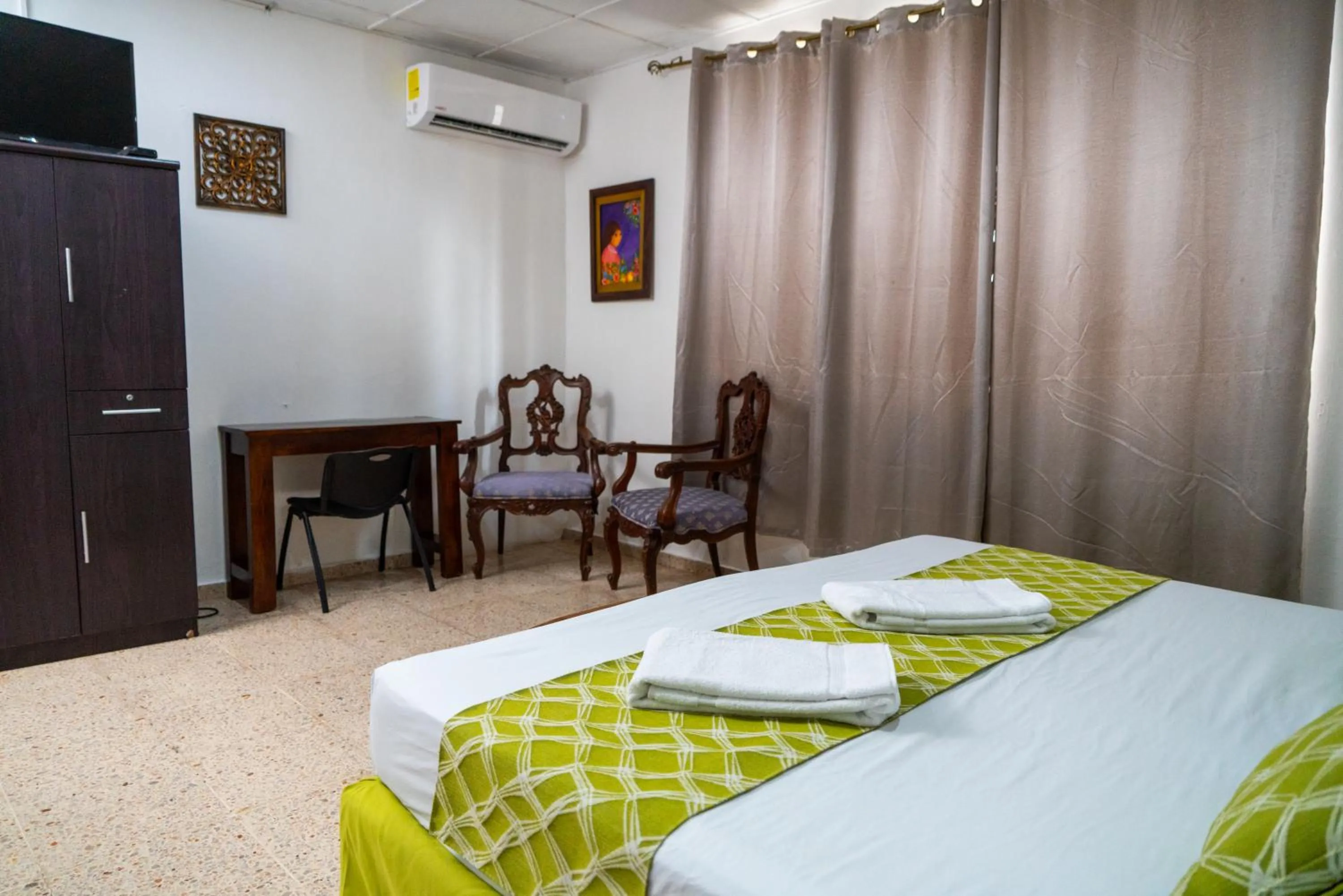 Bedroom, Bed in Suites & Apartments San Benito - Zona Rosa