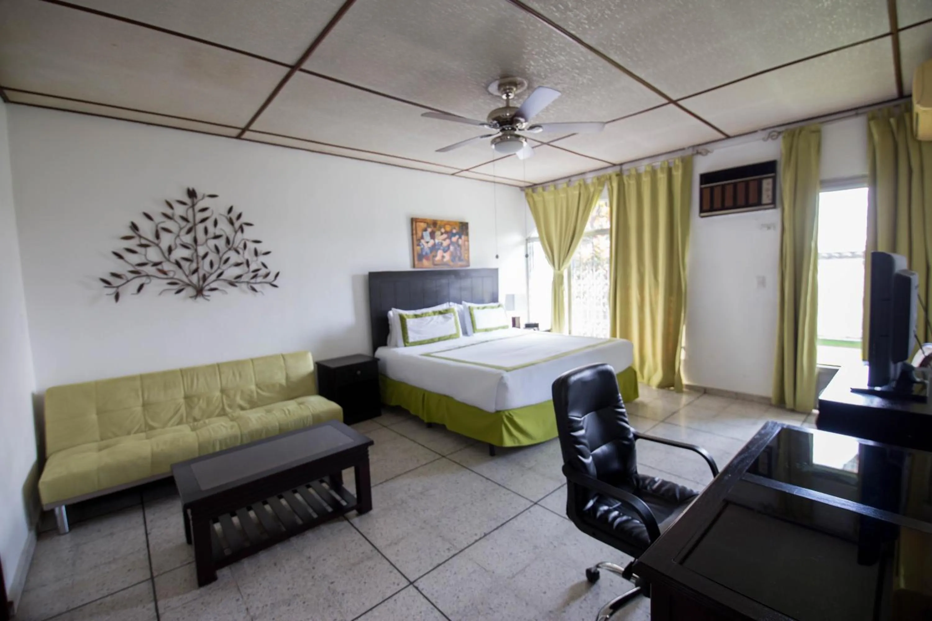 Bedroom, Bed in Suites & Apartments San Benito - Zona Rosa