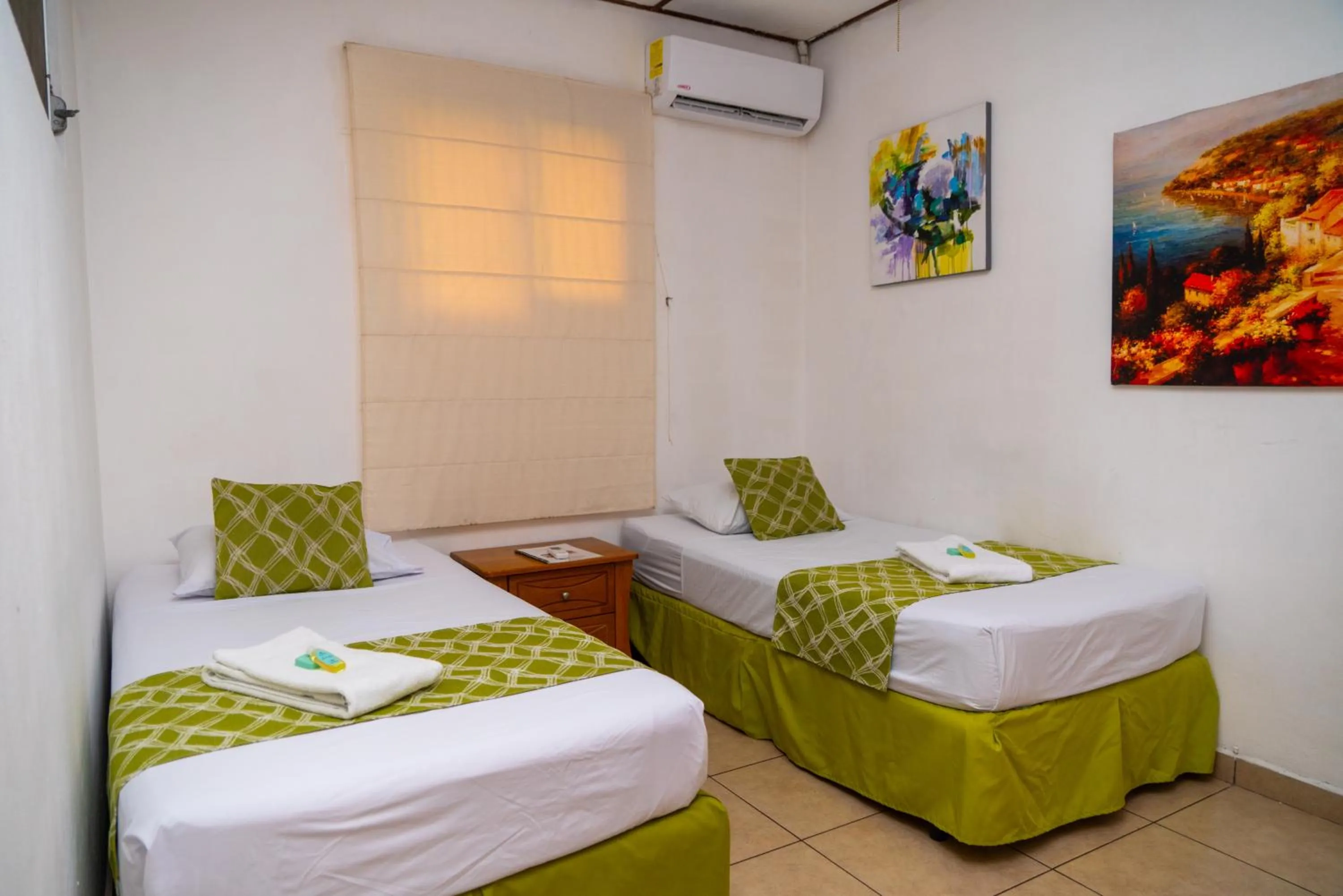 Bedroom, Bed in Suites & Apartments San Benito - Zona Rosa