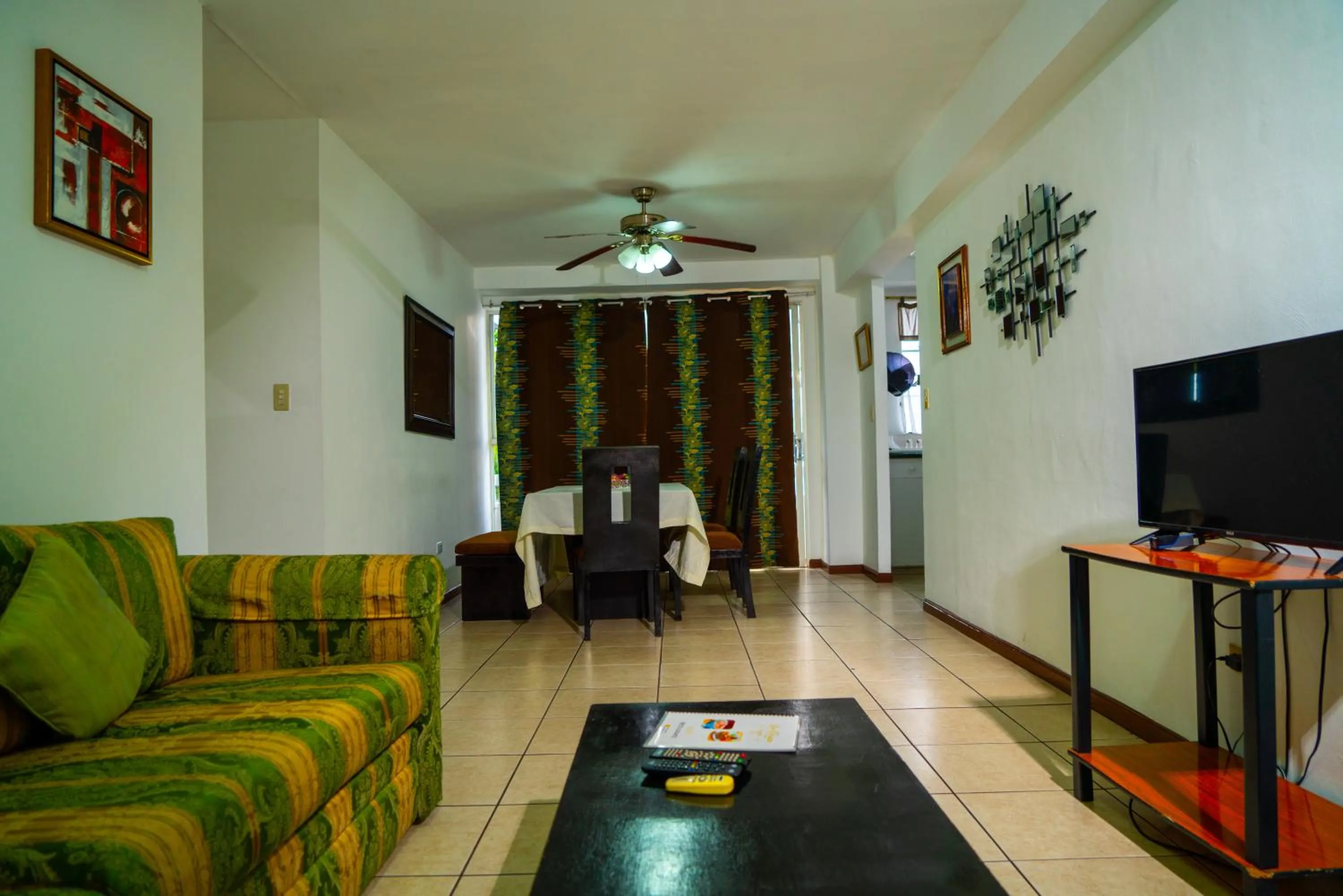 Communal lounge/ TV room in Suites & Apartments San Benito - Zona Rosa