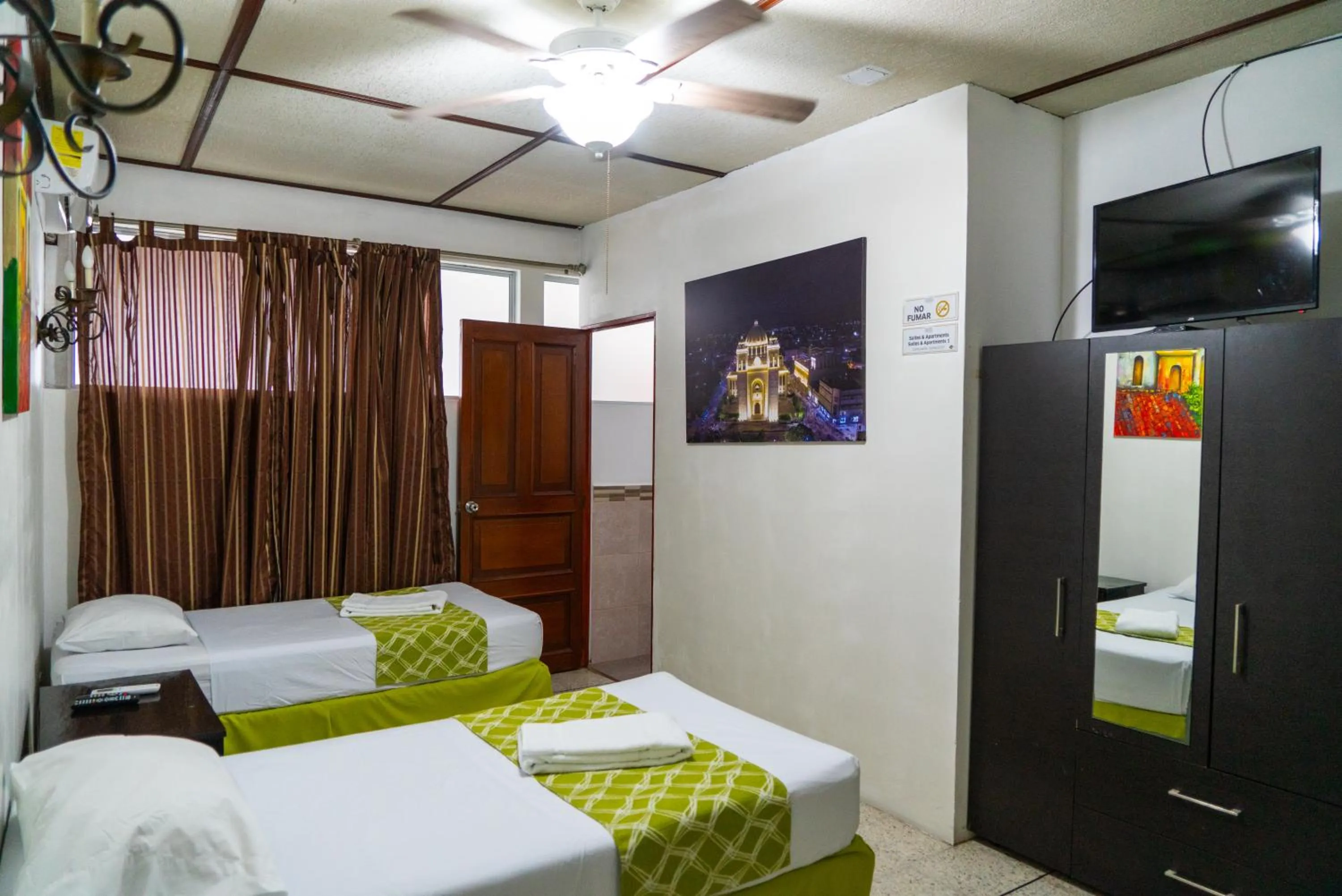 Bedroom, Bed in Suites & Apartments San Benito - Zona Rosa