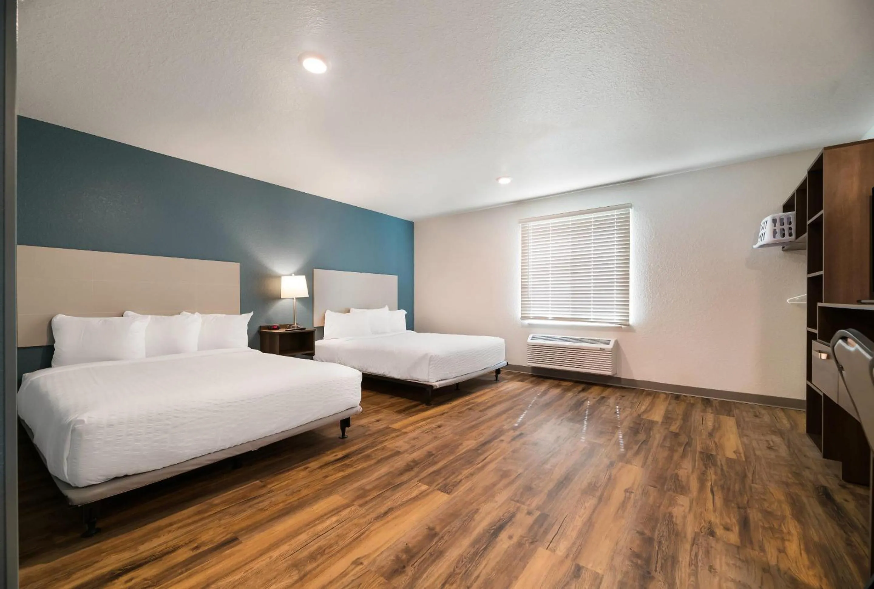 Bedroom, Bed in WoodSpring Suites Cocoa Beach - Rockledge