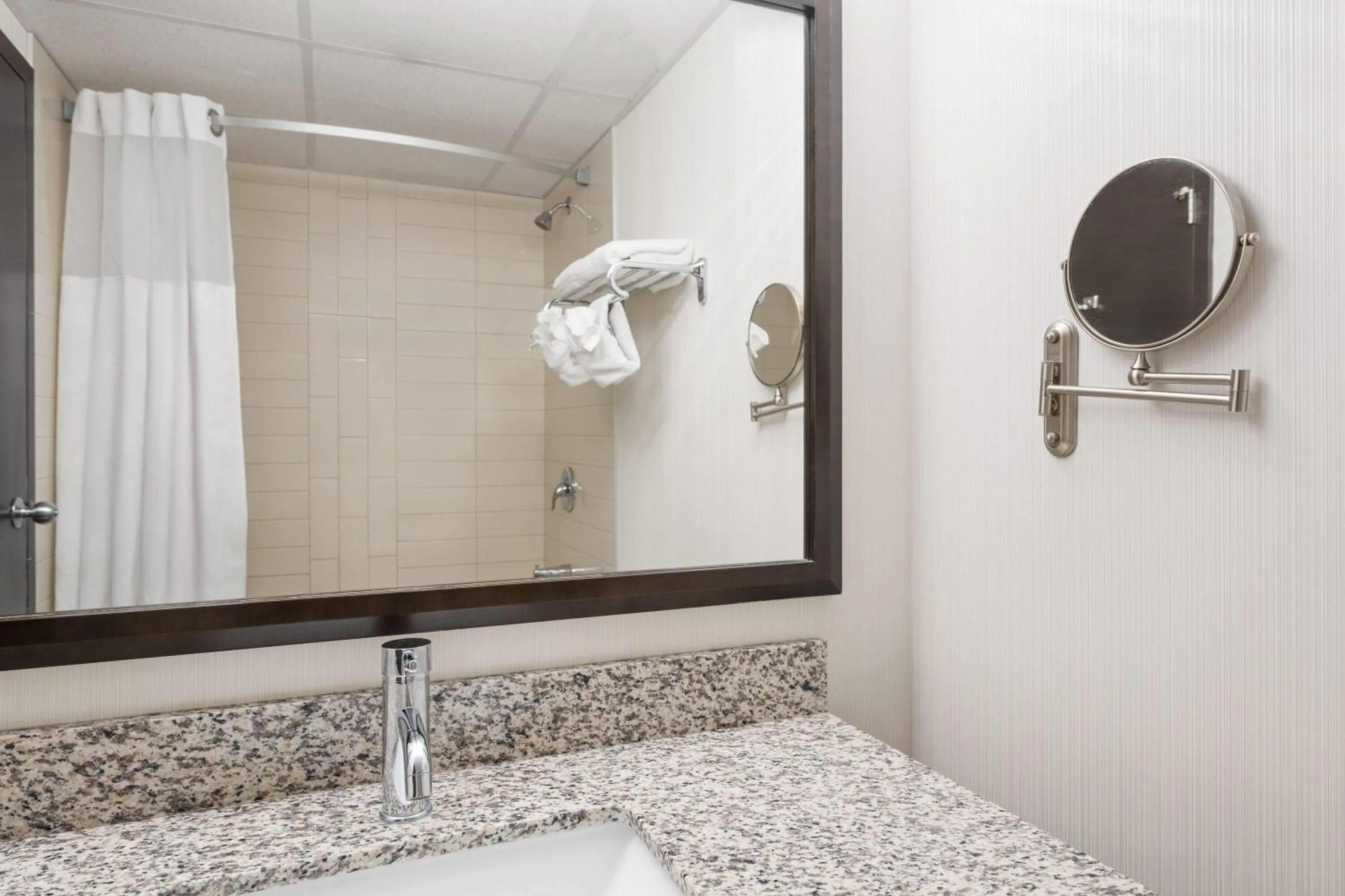 Bathroom in Ramada Plaza by Wyndham Regina Downtown