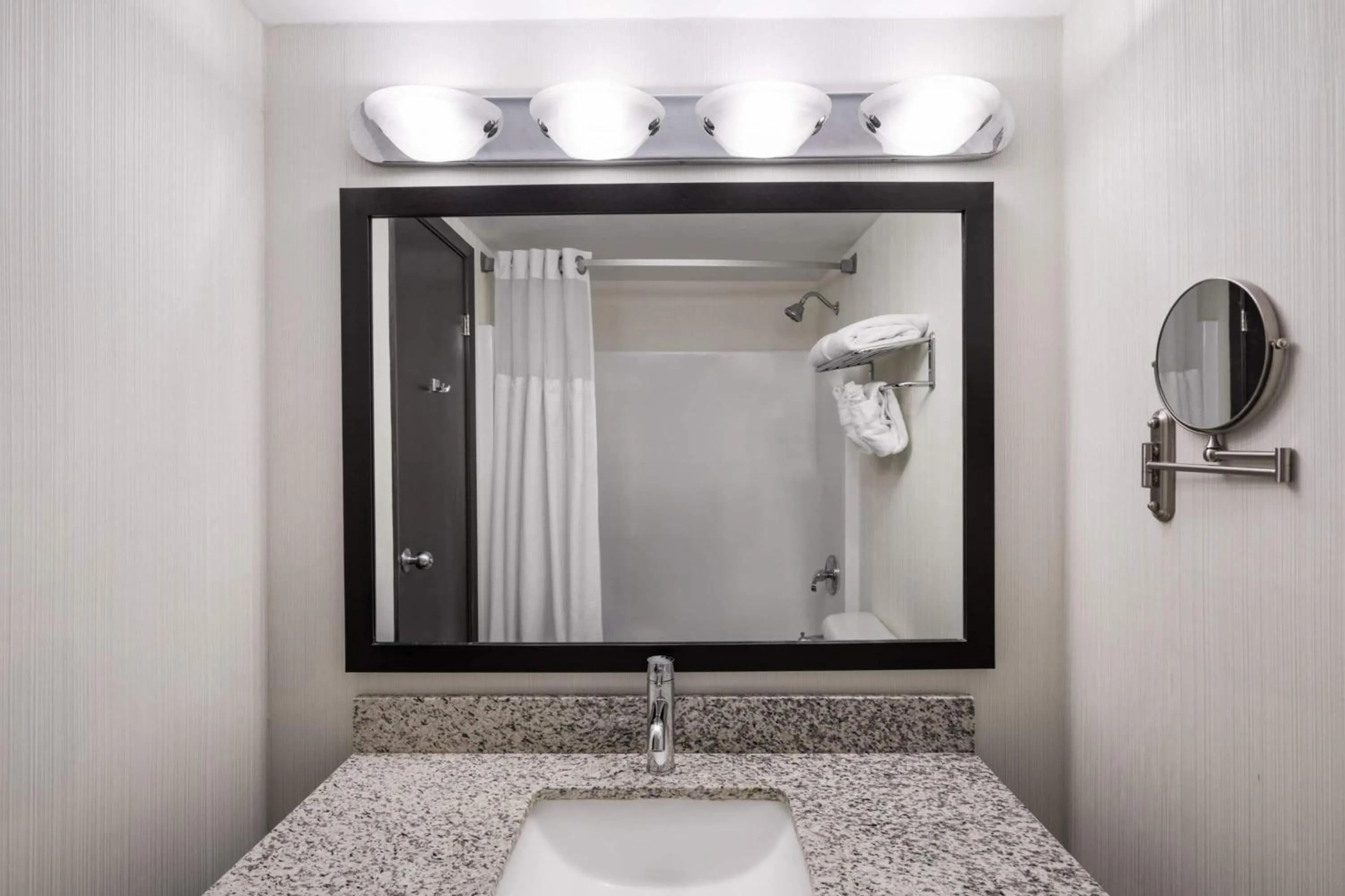 Bathroom in Ramada Plaza by Wyndham Regina Downtown