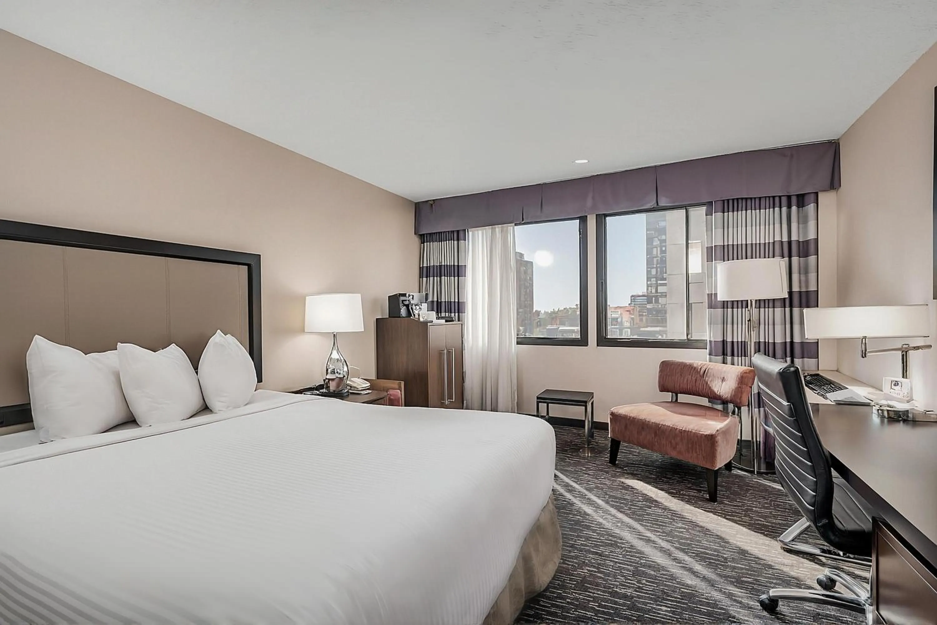 Bed in Ramada Plaza by Wyndham Regina Downtown