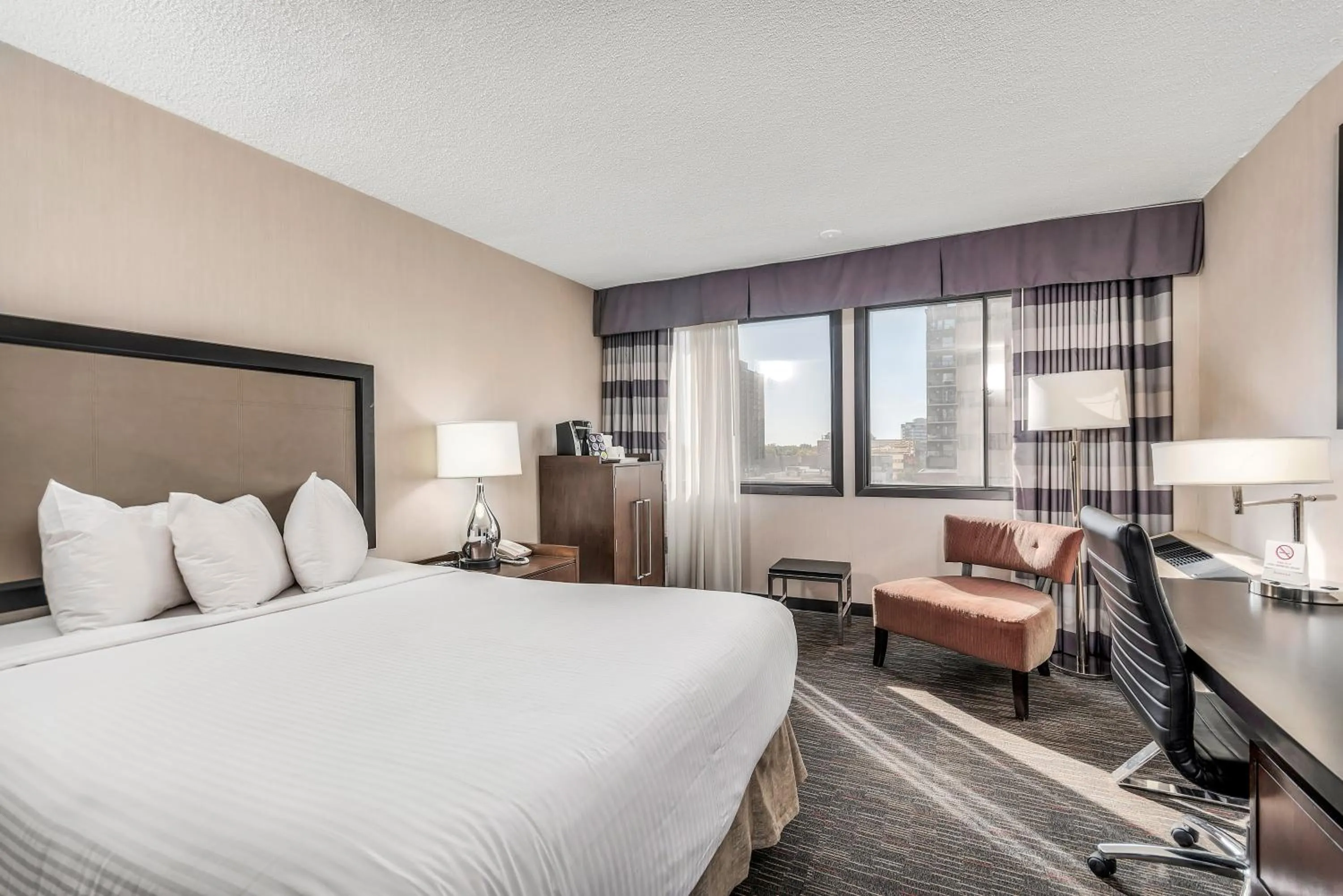 Bed in Ramada Plaza by Wyndham Regina Downtown