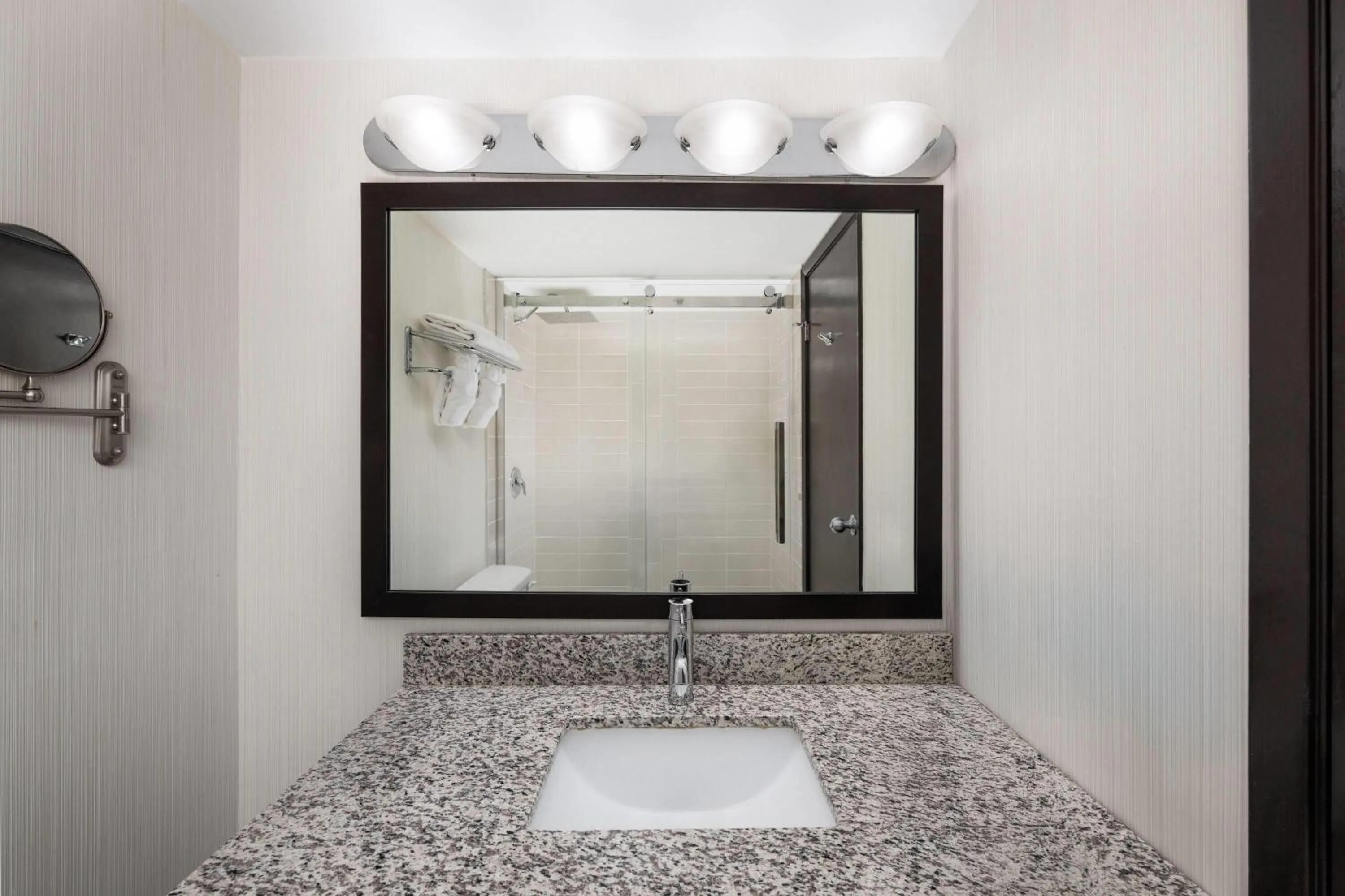 Bathroom in Ramada Plaza by Wyndham Regina Downtown