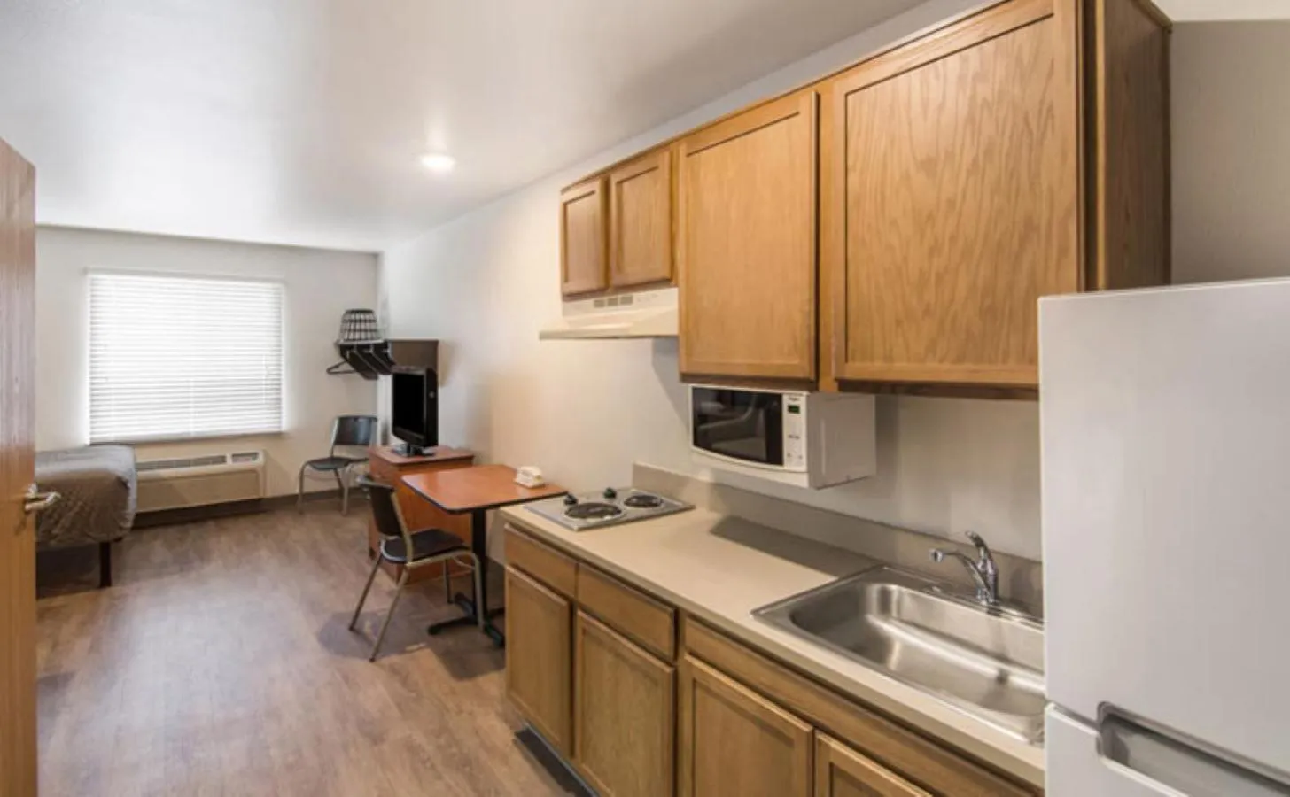 Photo of the whole room in WoodSpring Suites Port Orange - Daytona Beach