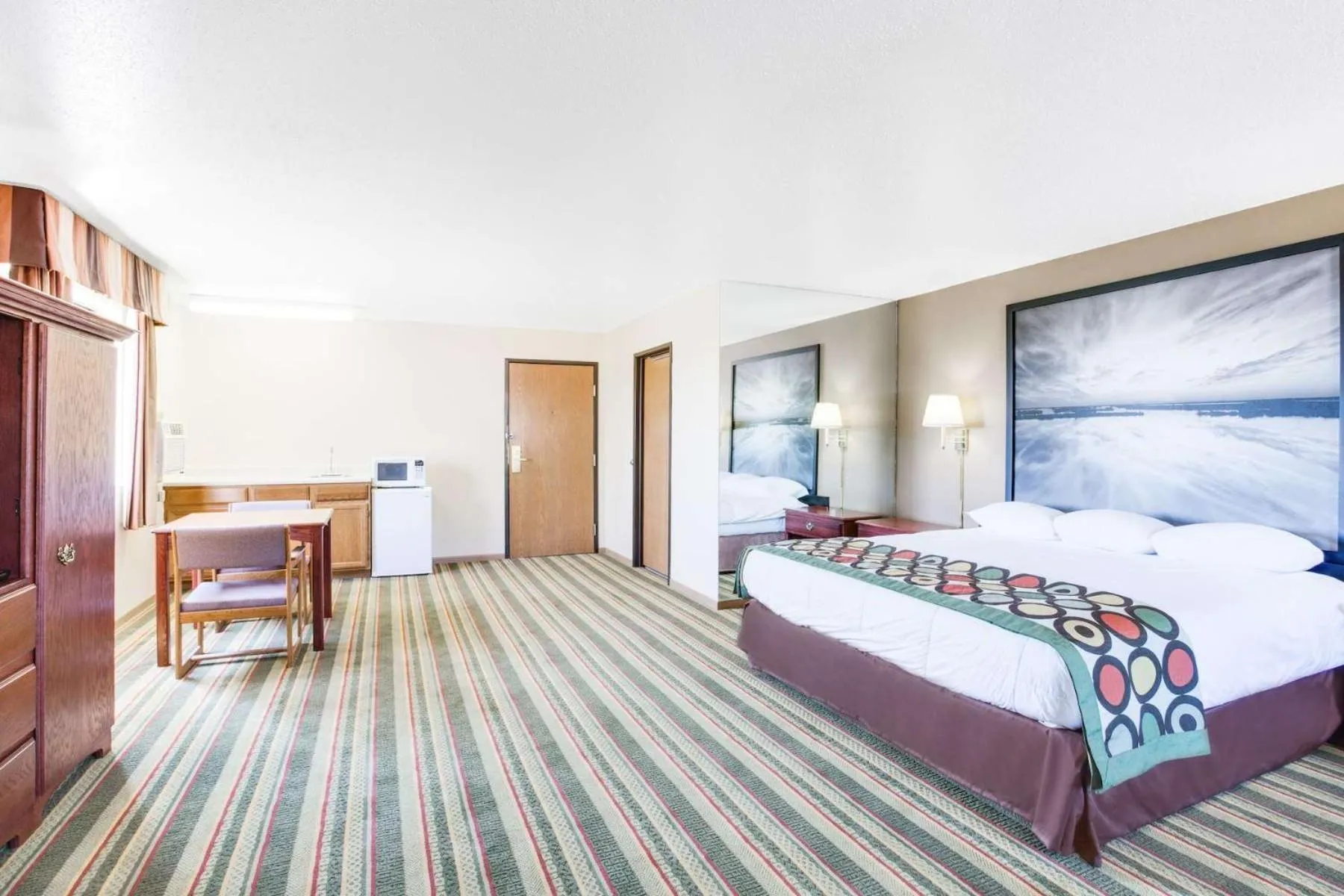 Bed in Super 8 by Wyndham Mitchell