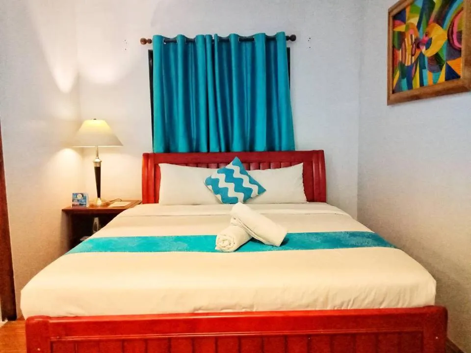 Bed in Discover Boracay Hotel