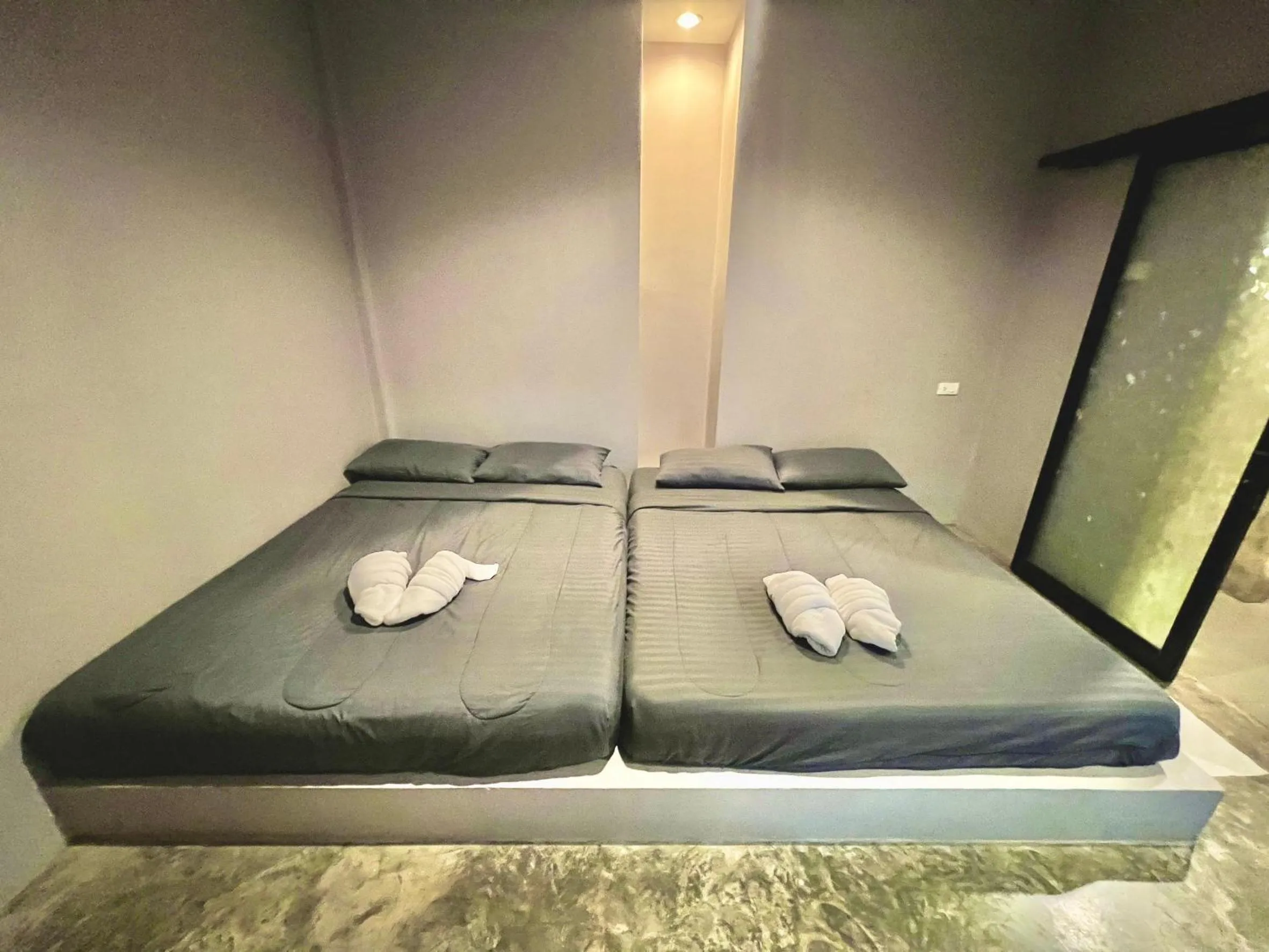 Bed in PHUPA BEACH Resort