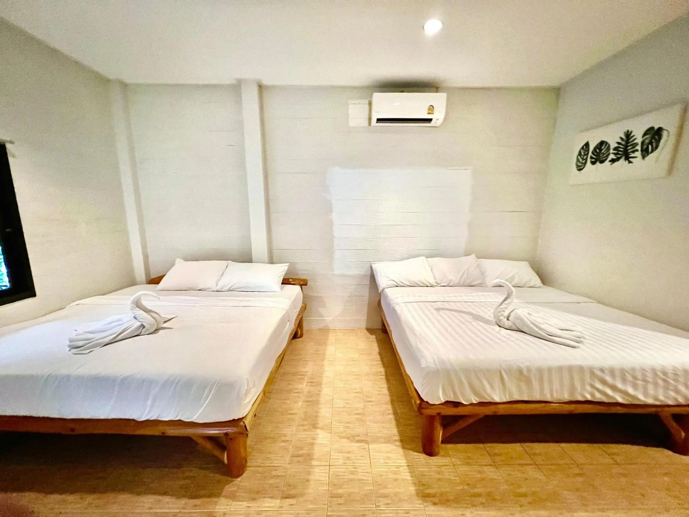 Bed in PHUPA BEACH Resort