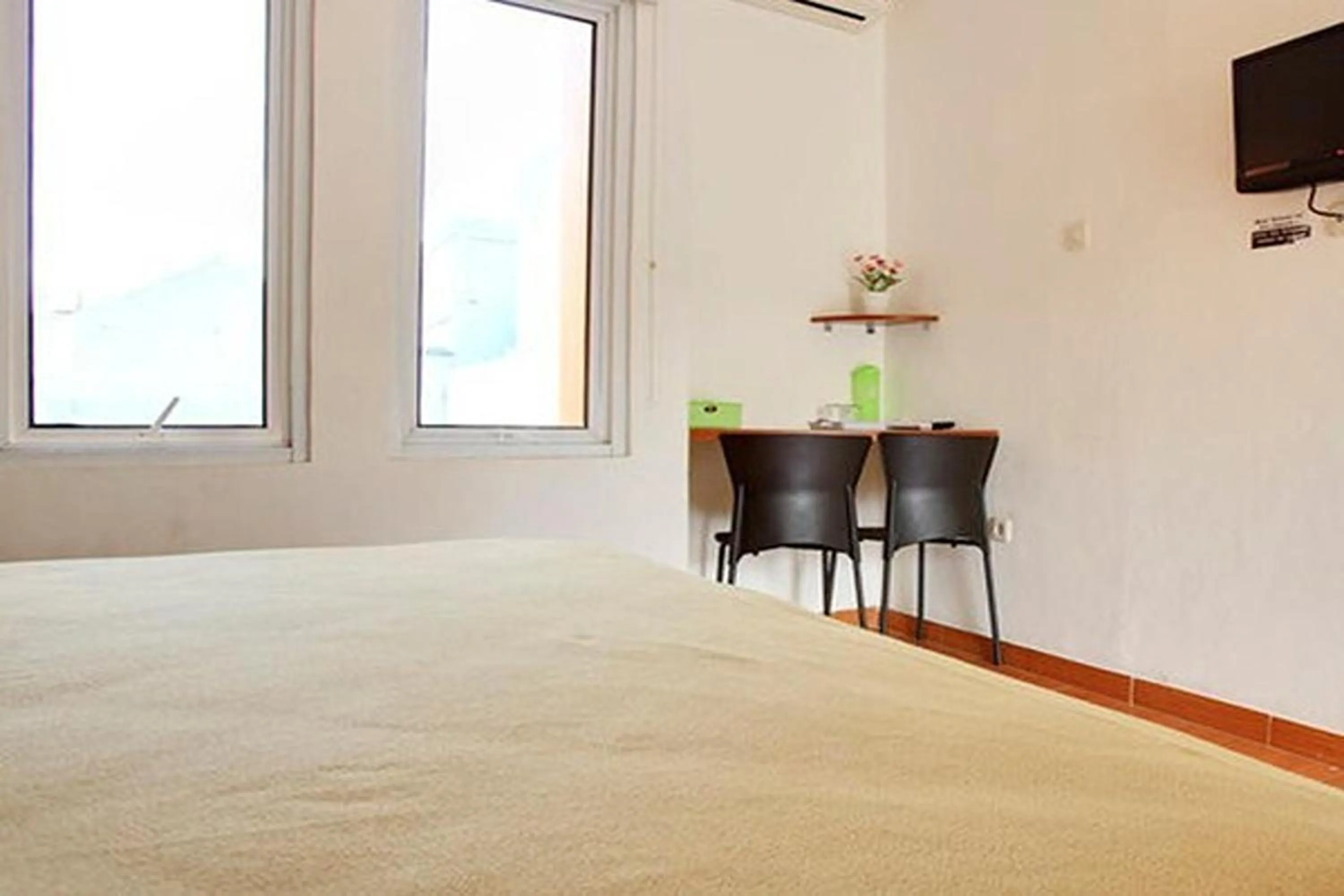 TV and multimedia, Bed in Aryani Suites Syariah