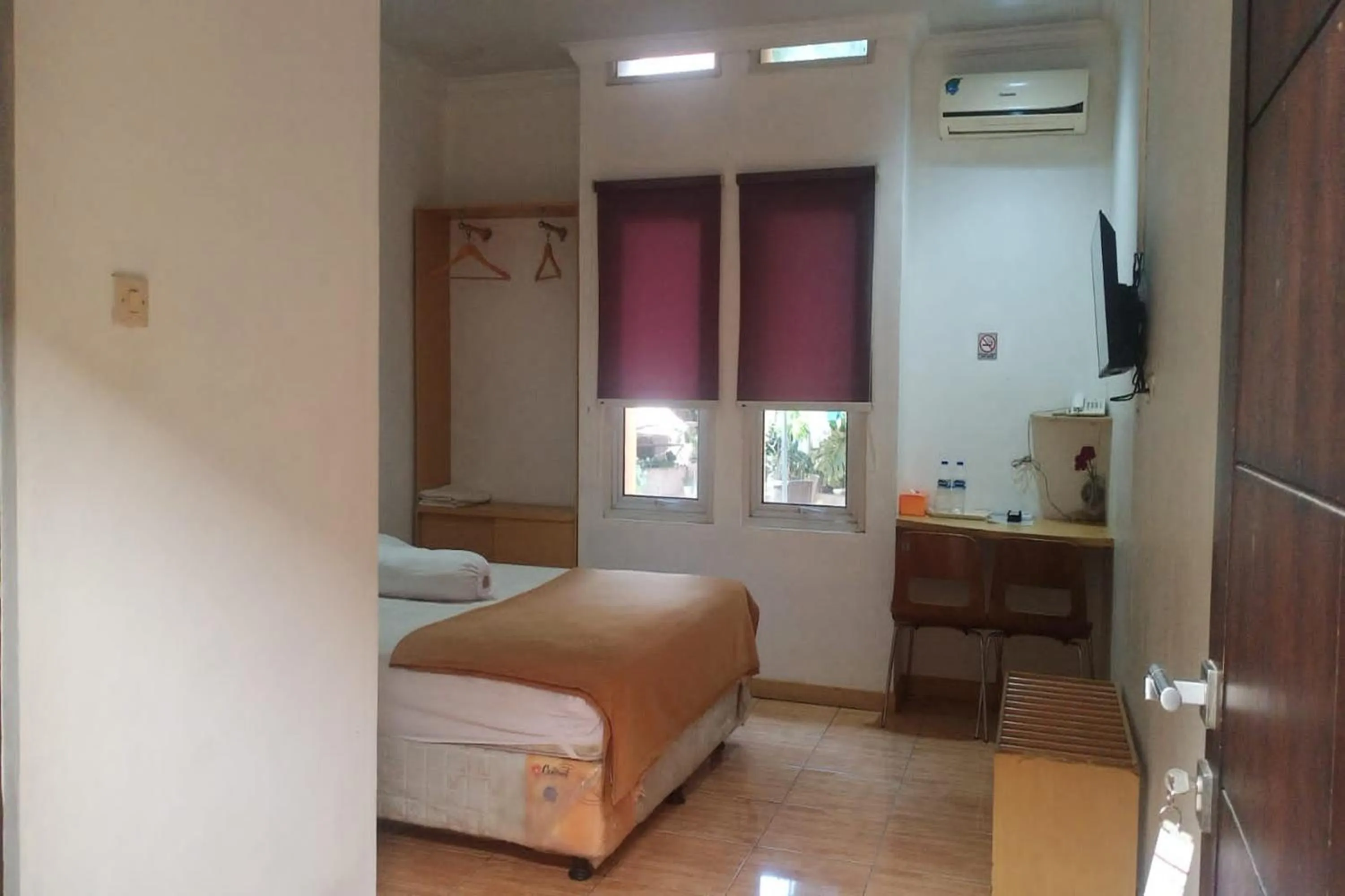 Bedroom, Bed in Aryani Suites Syariah