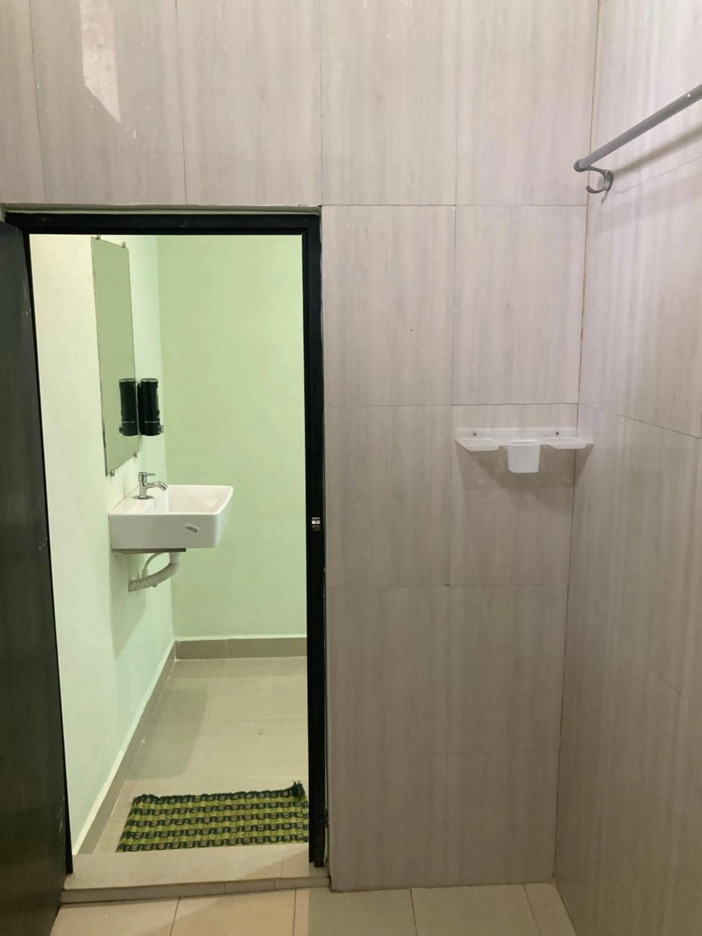 Bathroom in Oceanic Stay And Restaurant Gokarna