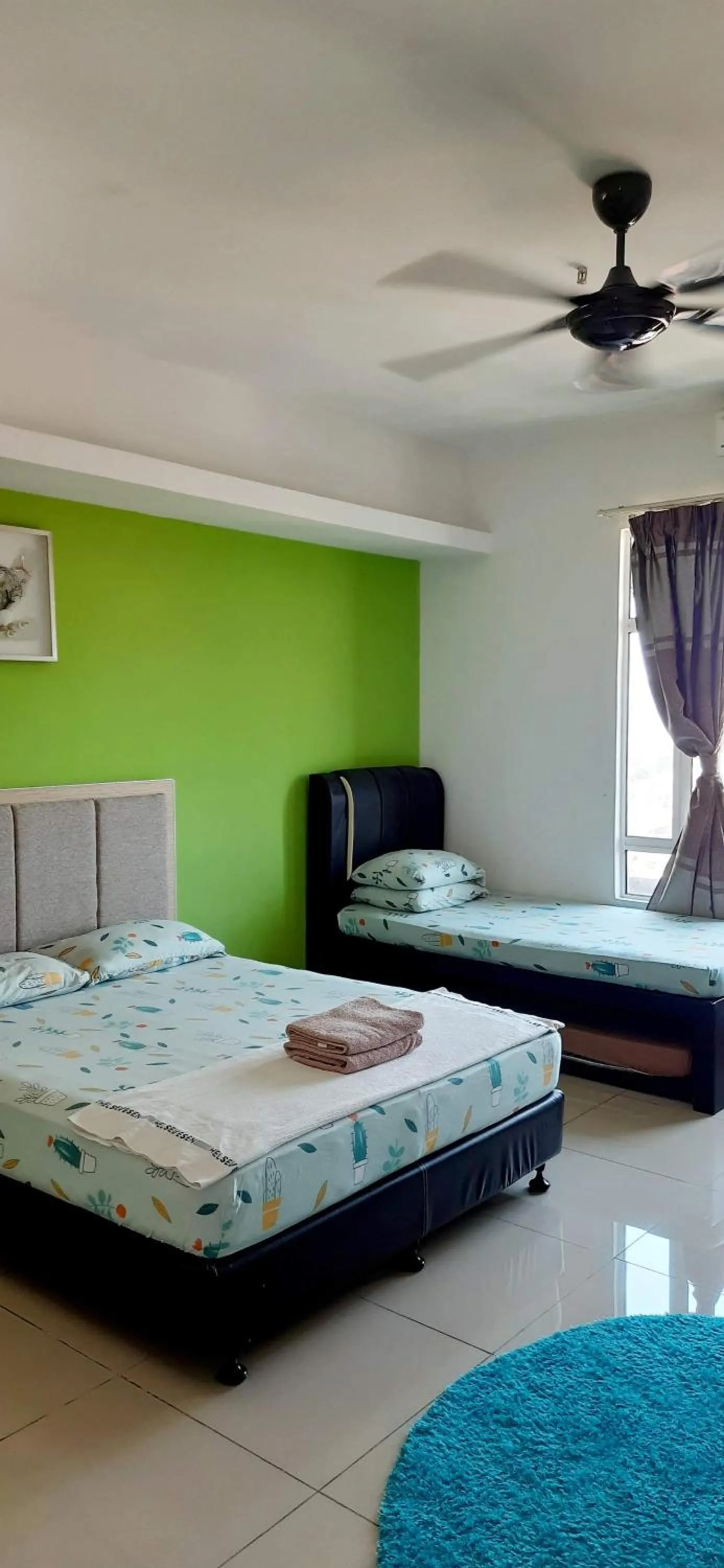 Bed in De Viana Apartments Homestay