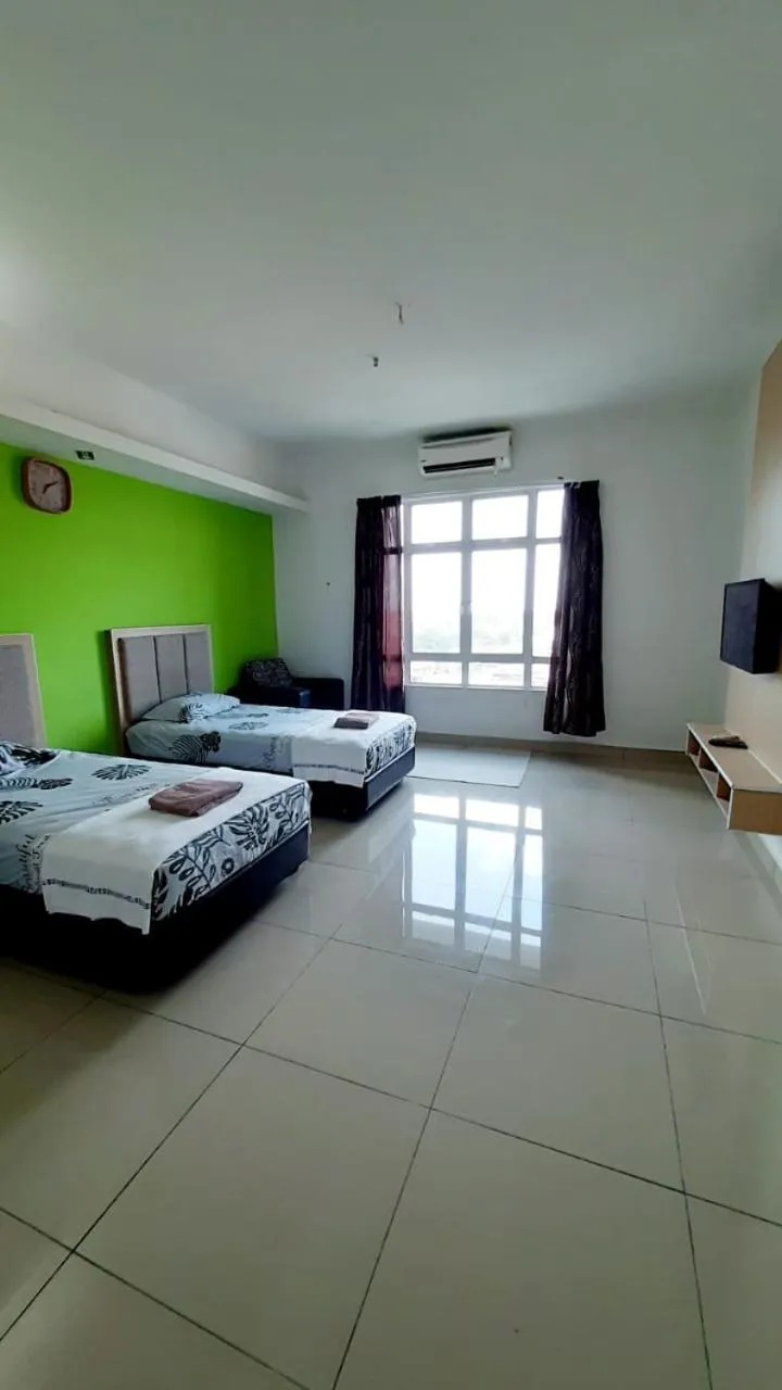 Bed in De Viana Apartments Homestay