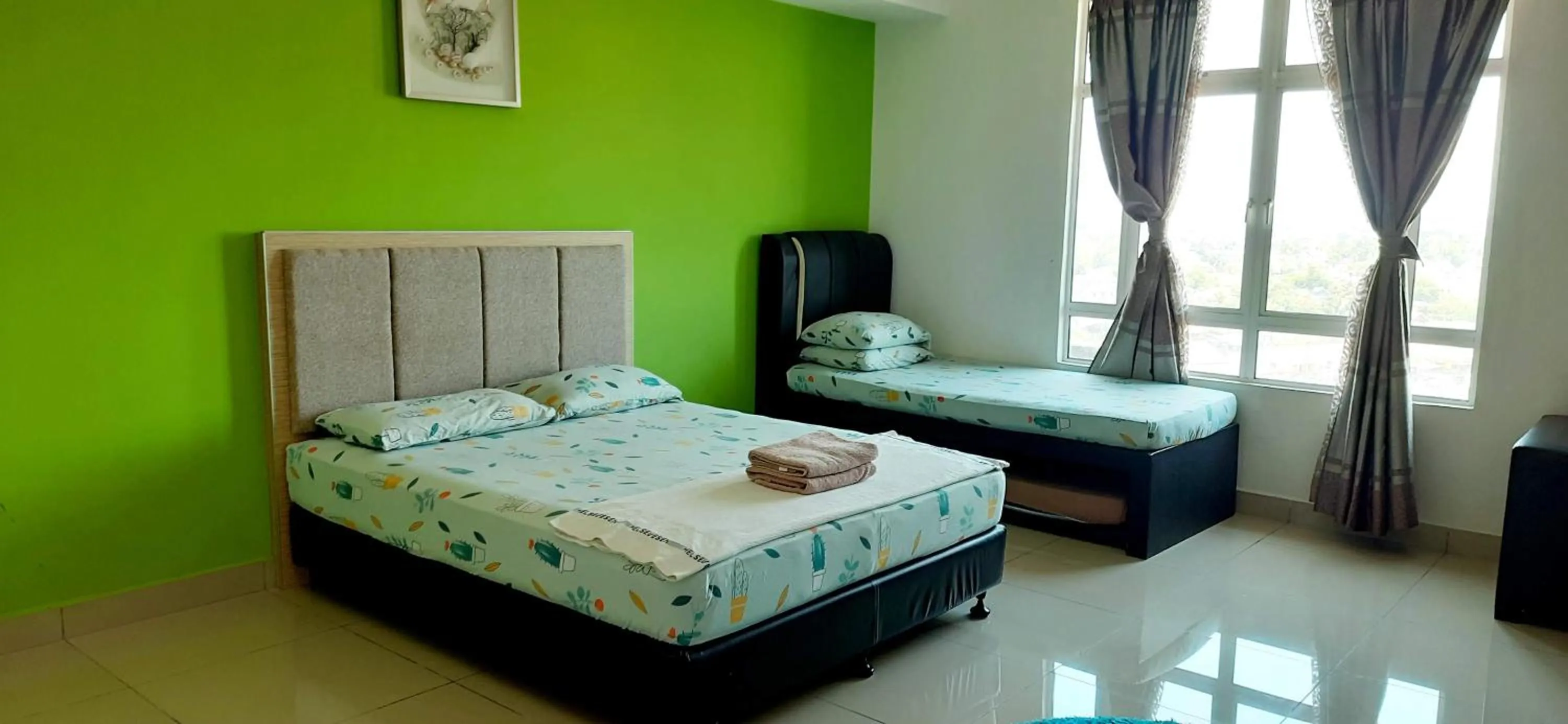 Bed in De Viana Apartments Homestay