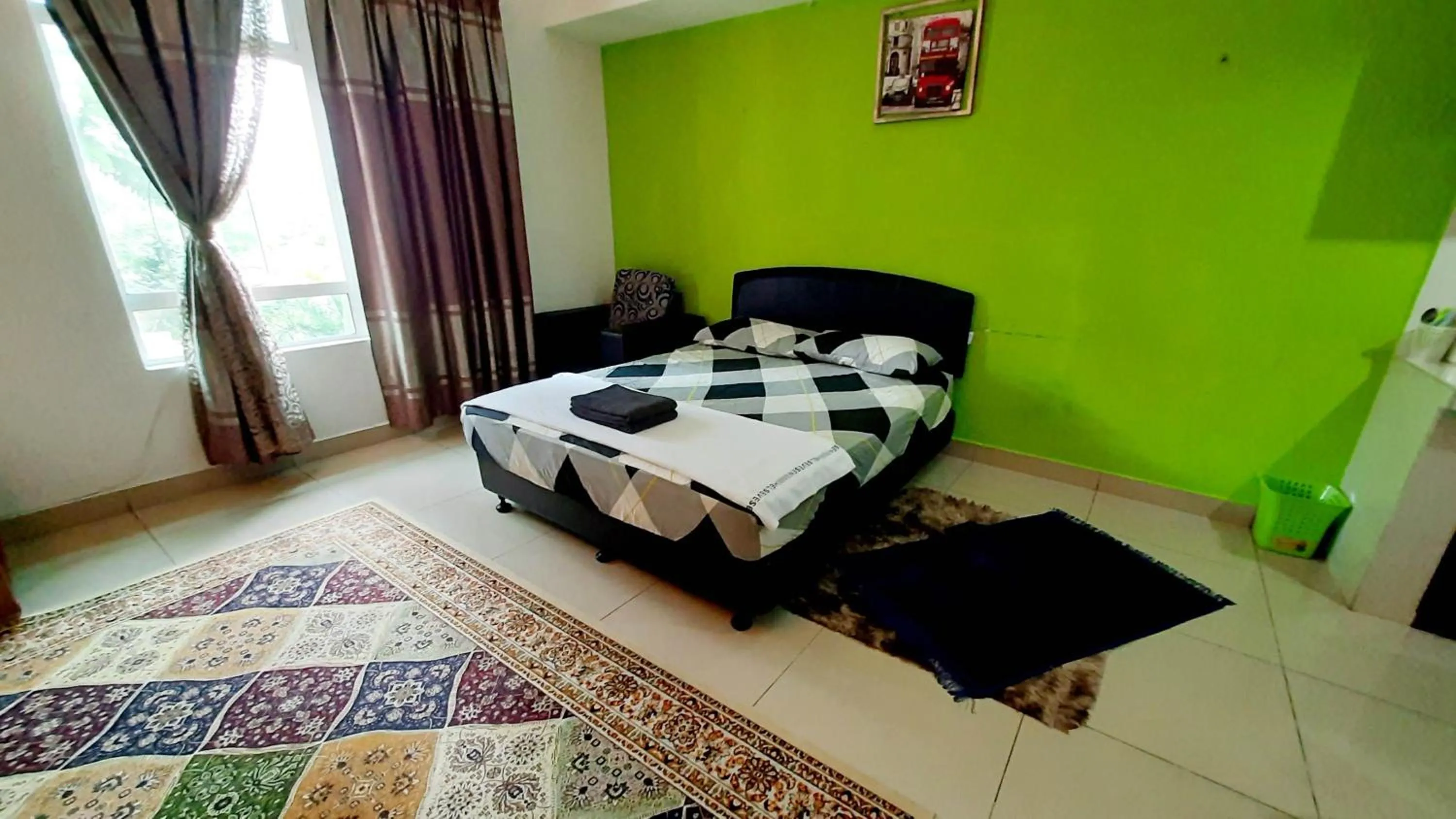 Bed in De Viana Apartments Homestay
