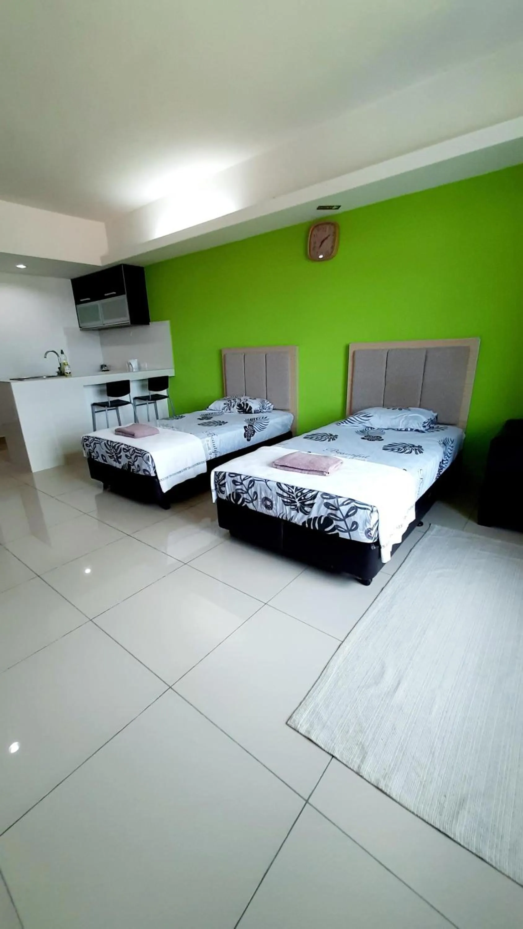 Bed in De Viana Apartments Homestay