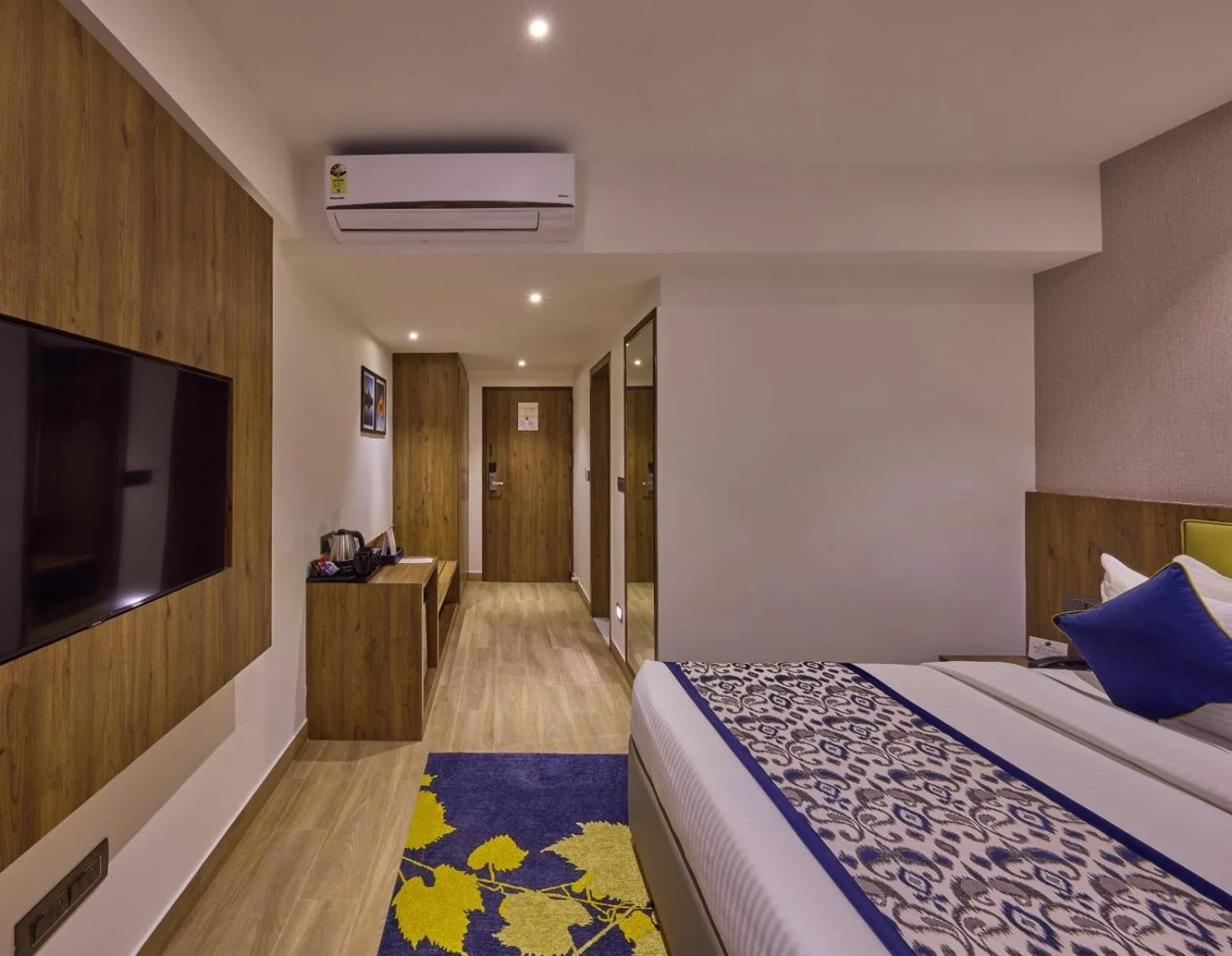 Bedroom, Bed in Grand Continent Hebbal A Sarovar Portico Affiliate Hotel