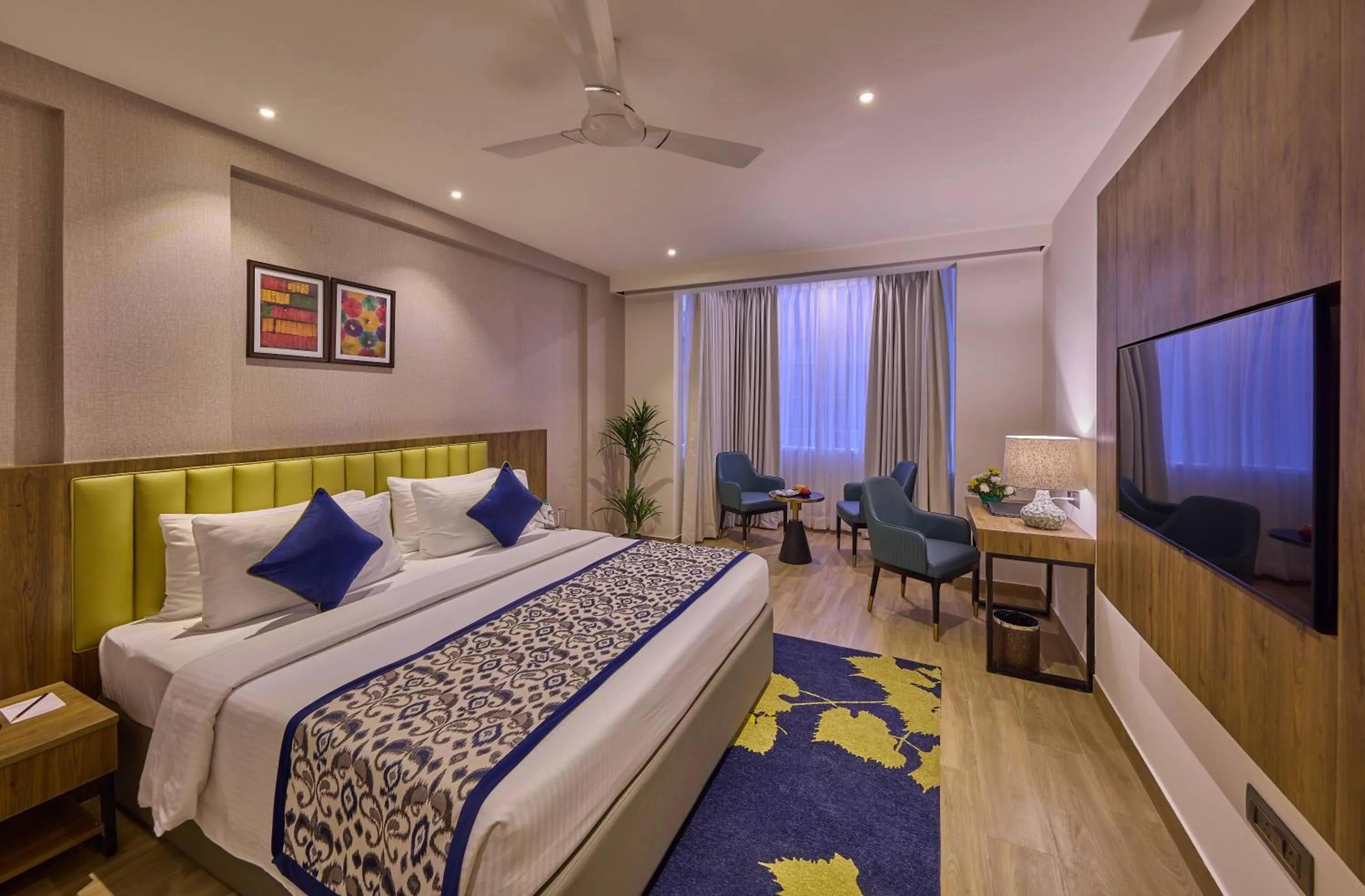 Bedroom, Bed in Grand Continent Hebbal A Sarovar Portico Affiliate Hotel
