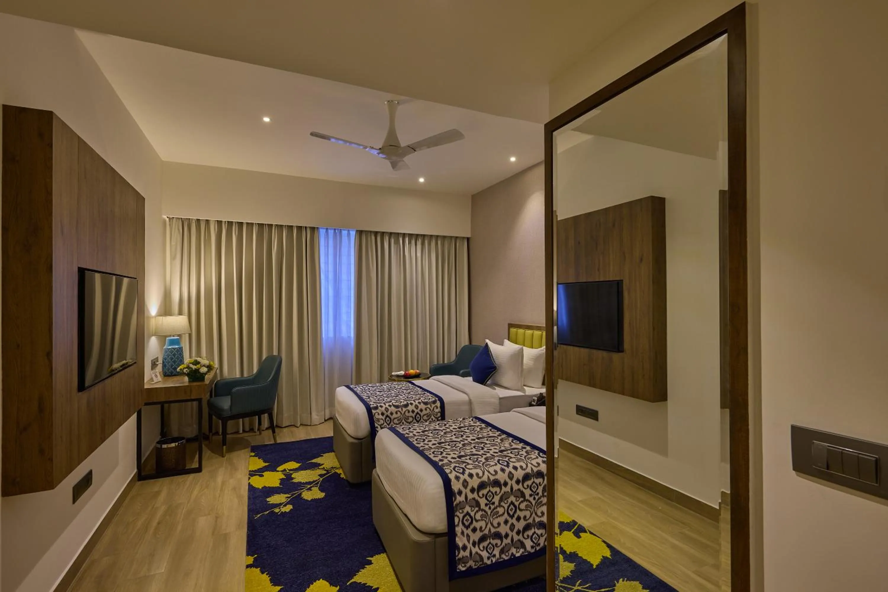 Bedroom, Bed in Grand Continent Hebbal A Sarovar Portico Affiliate Hotel