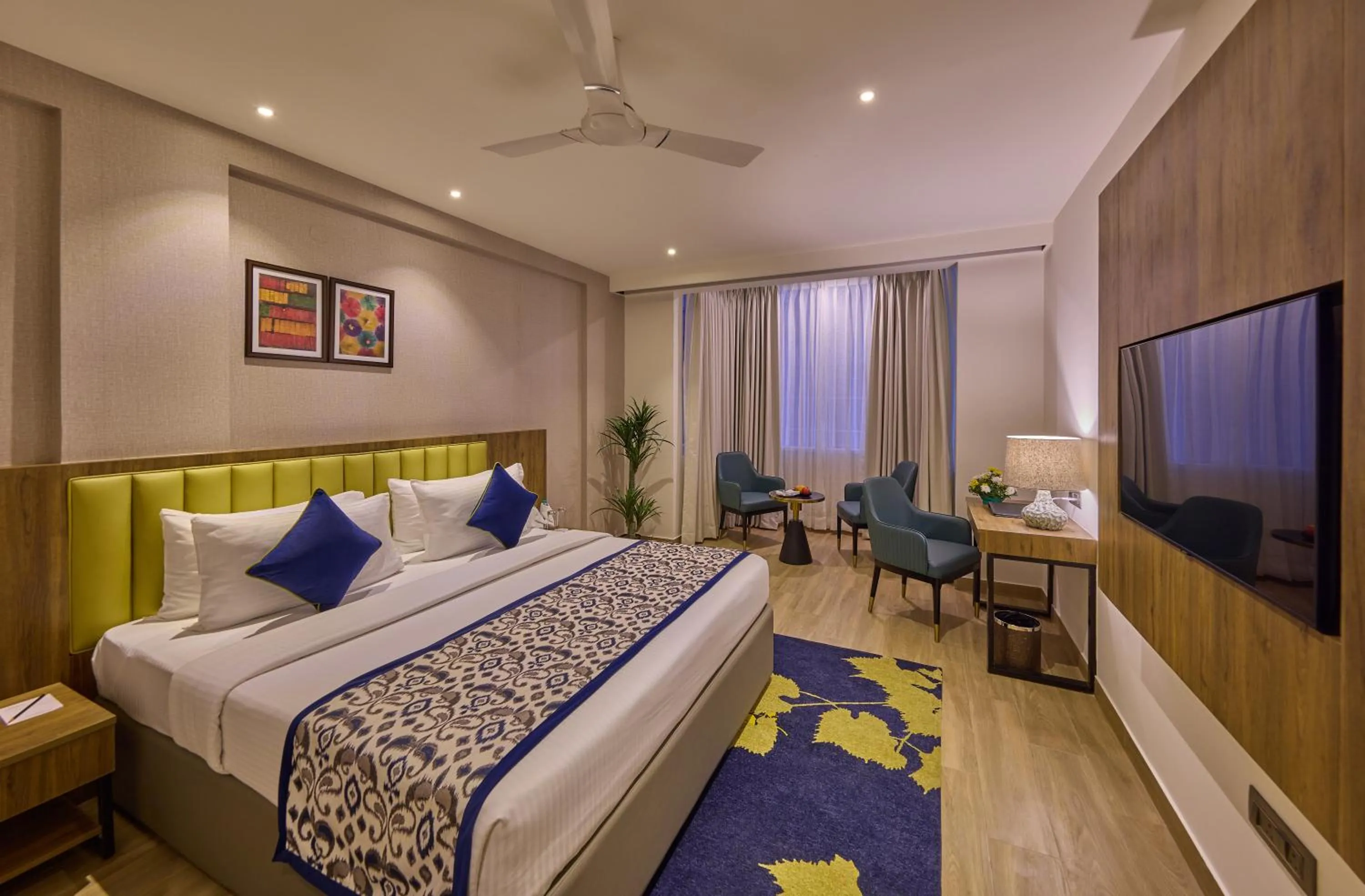 Bedroom, Bed in Grand Continent Hebbal A Sarovar Portico Affiliate Hotel