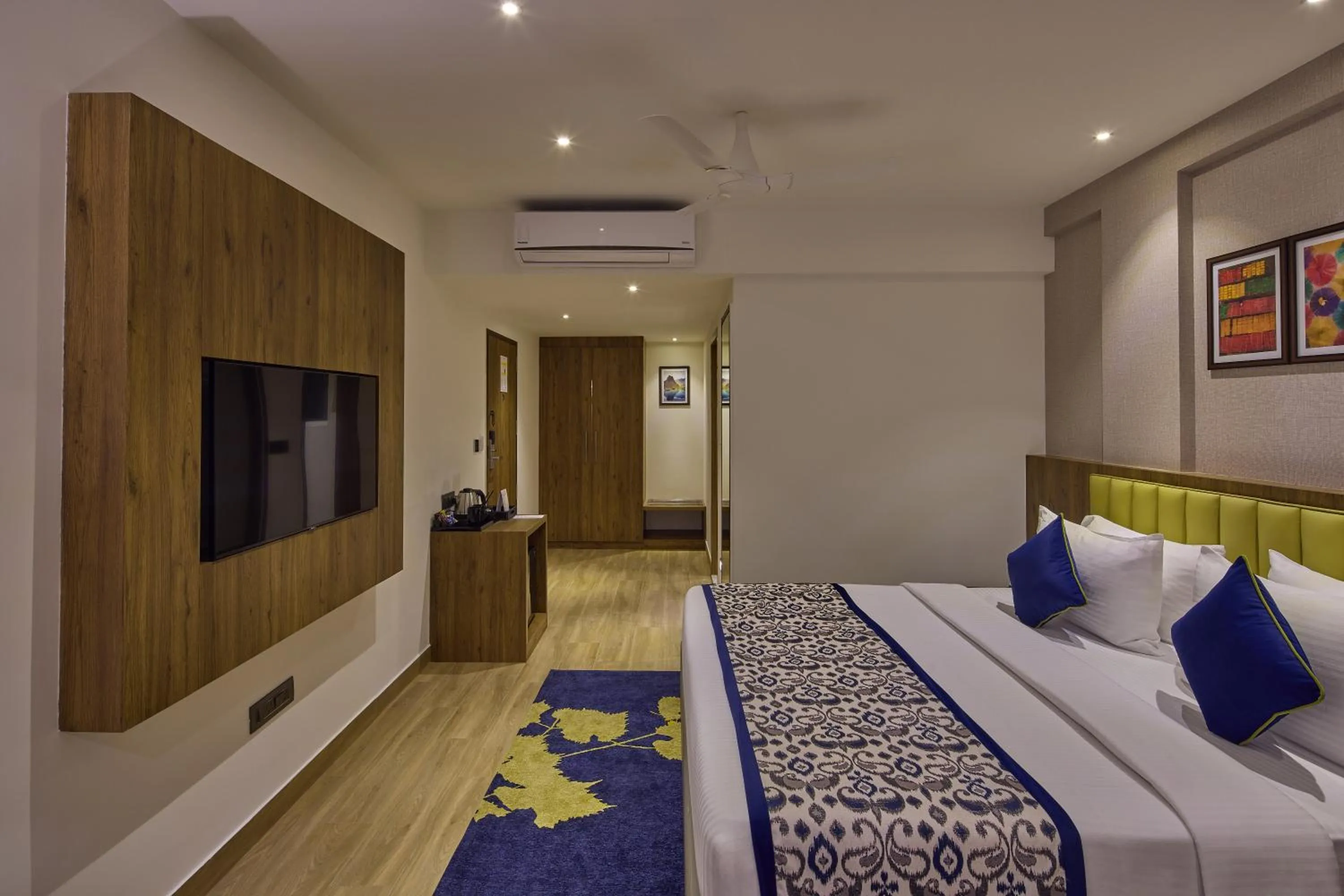 Bedroom, Bed in Grand Continent Hebbal A Sarovar Portico Affiliate Hotel