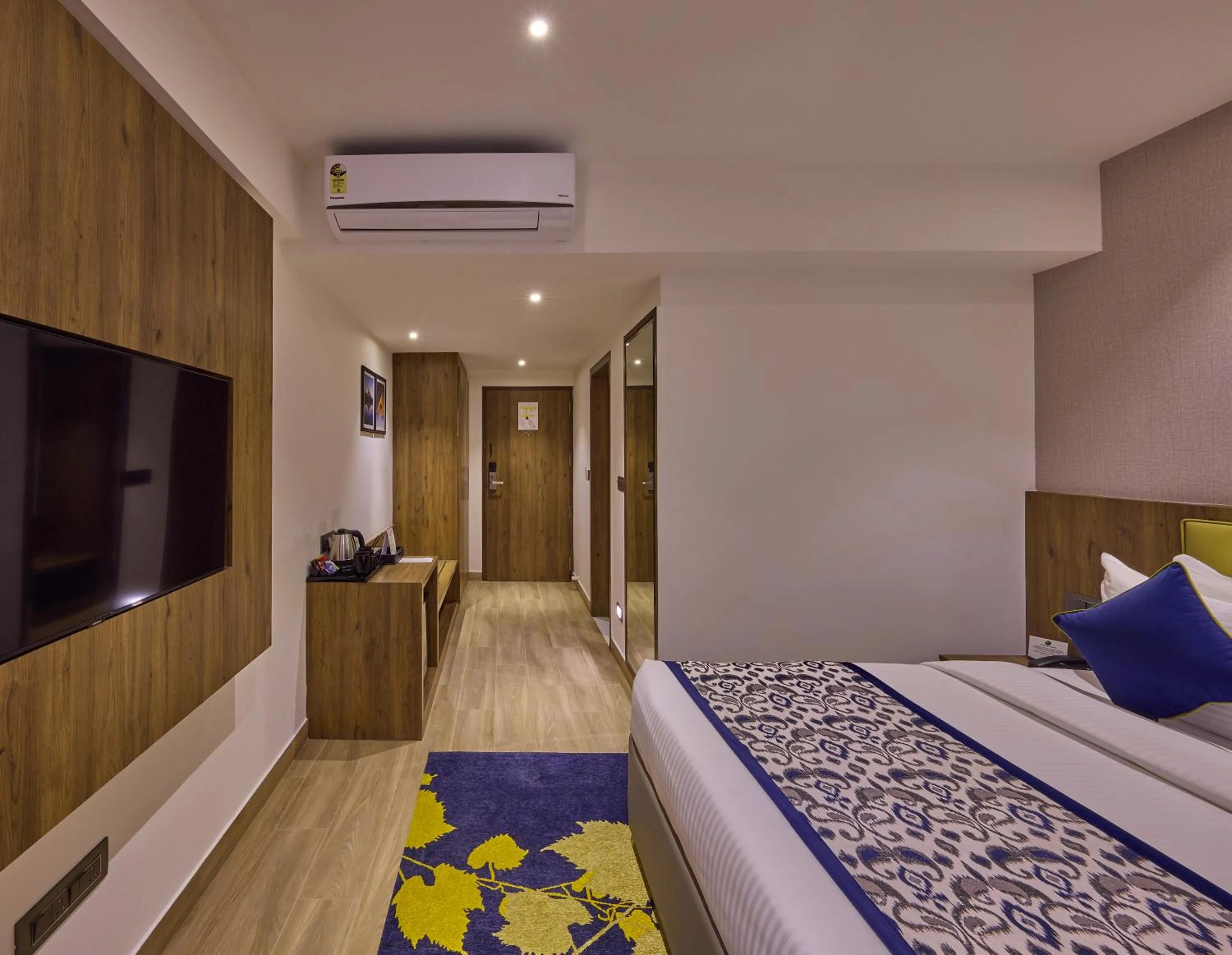 Bedroom, Bed in Grand Continent Hebbal A Sarovar Portico Affiliate Hotel