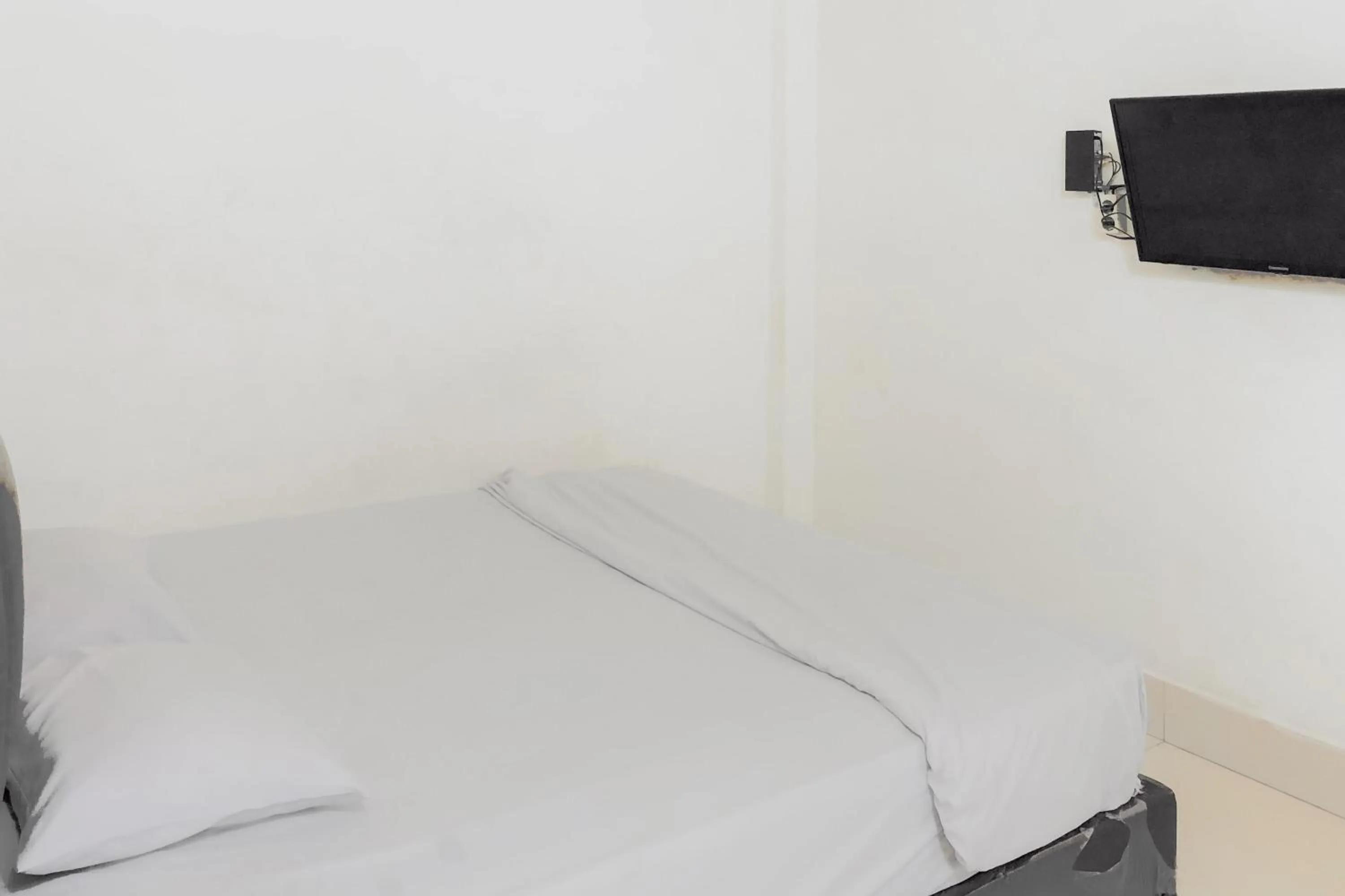 Bedroom in Hotel Mulia Tiza Binjai RedPartner