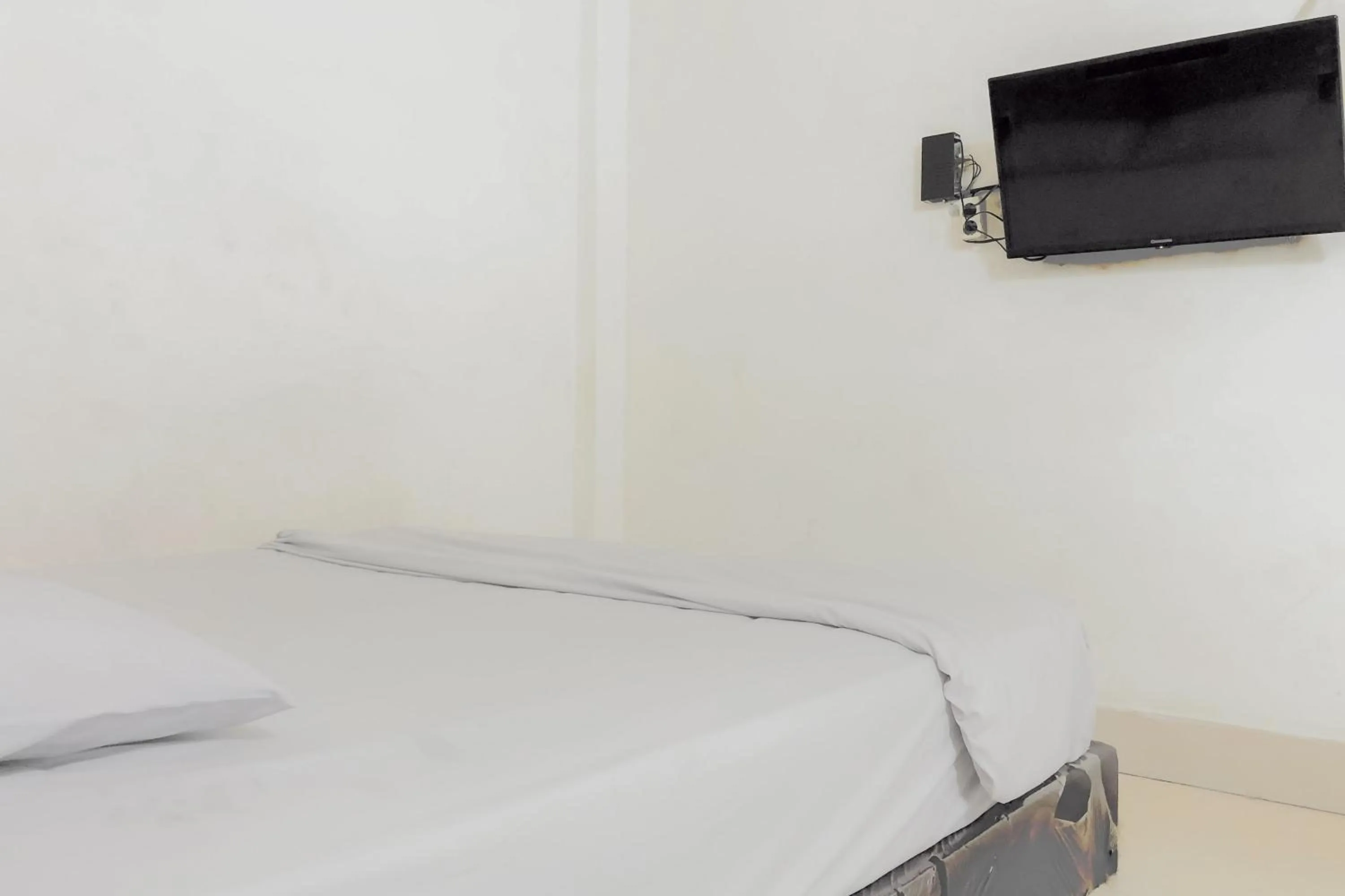 Bedroom in Hotel Mulia Tiza Binjai RedPartner