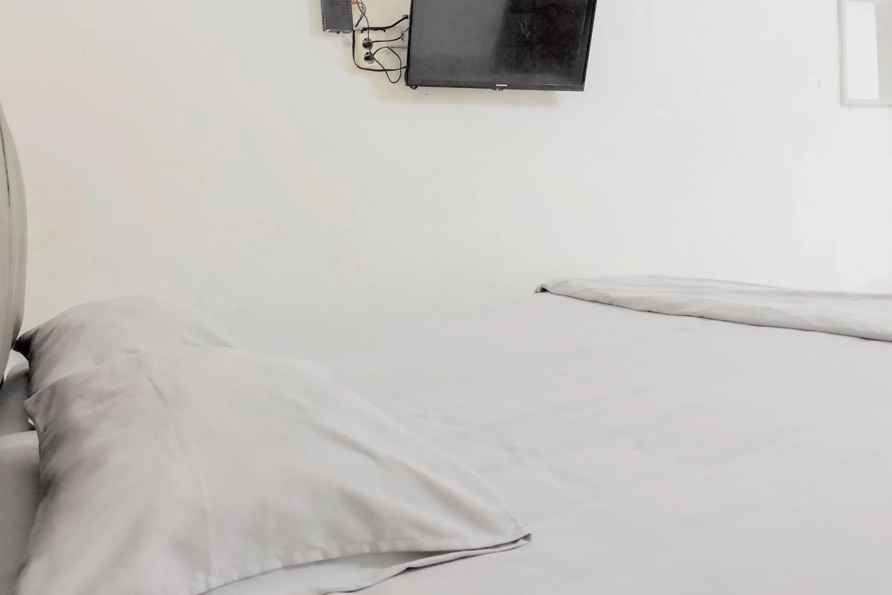 Bedroom in Hotel Mulia Tiza Binjai RedPartner