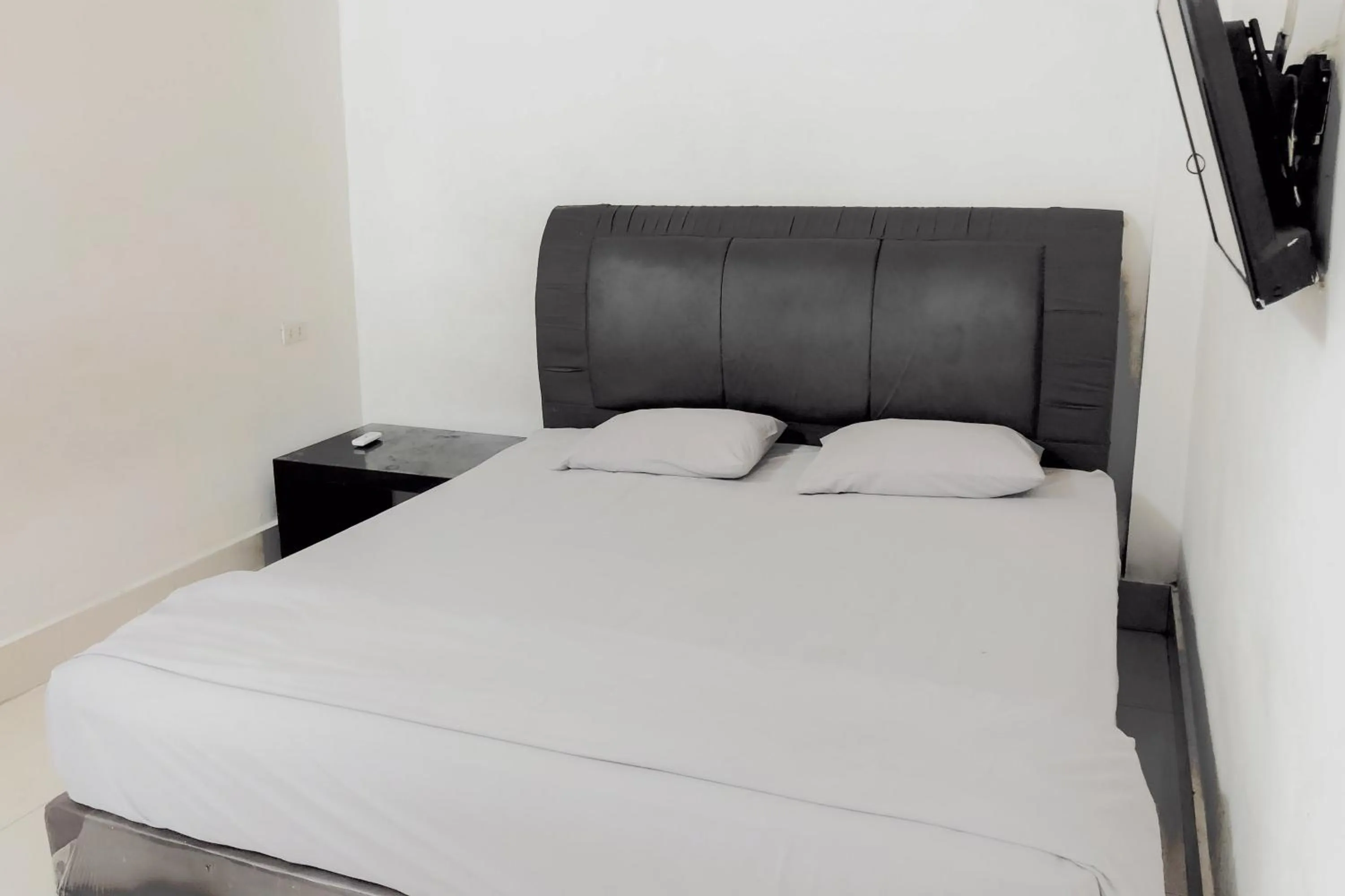 Bedroom in Hotel Mulia Tiza Binjai RedPartner