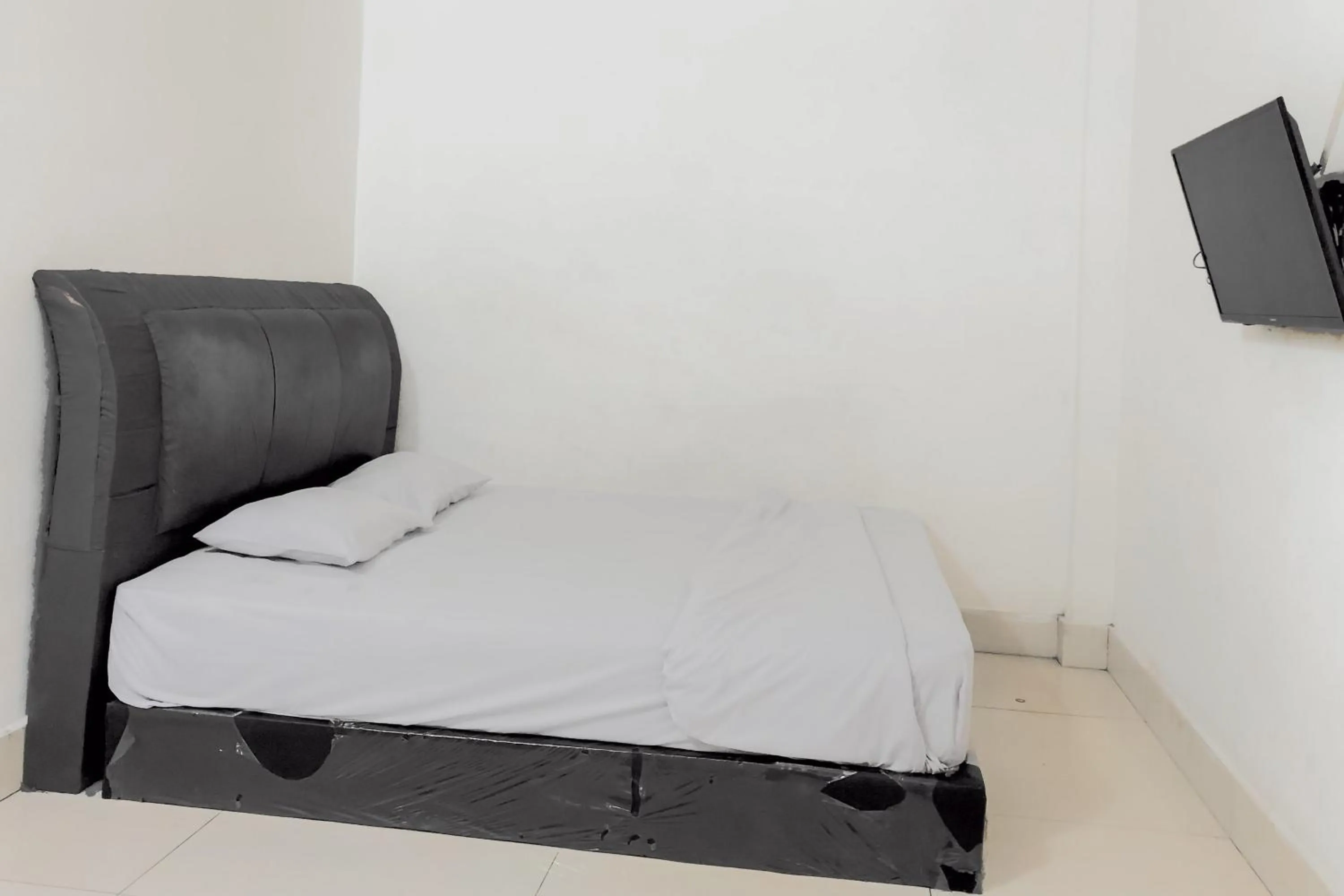 Bedroom in Hotel Mulia Tiza Binjai RedPartner