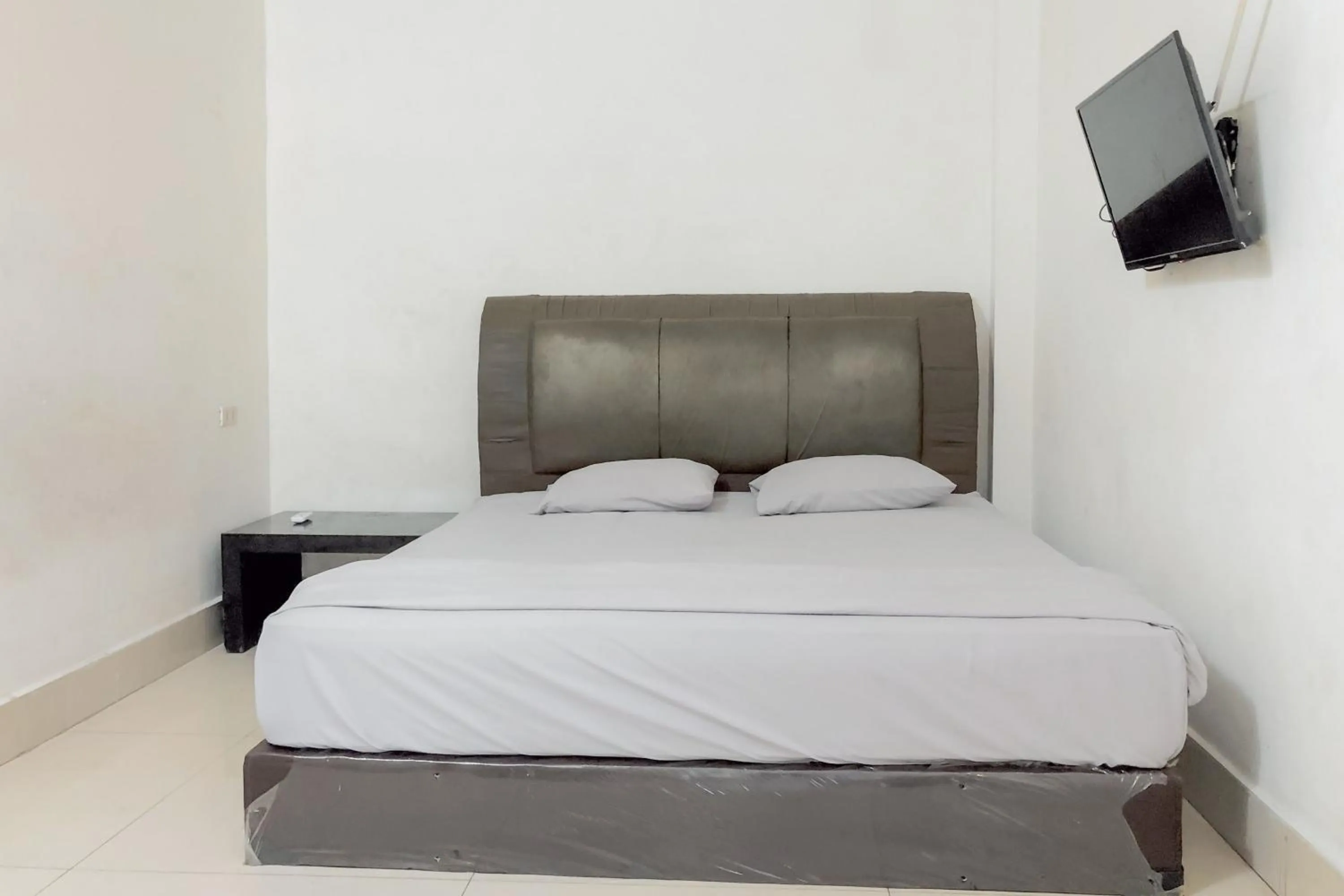 Bedroom in Hotel Mulia Tiza Binjai RedPartner