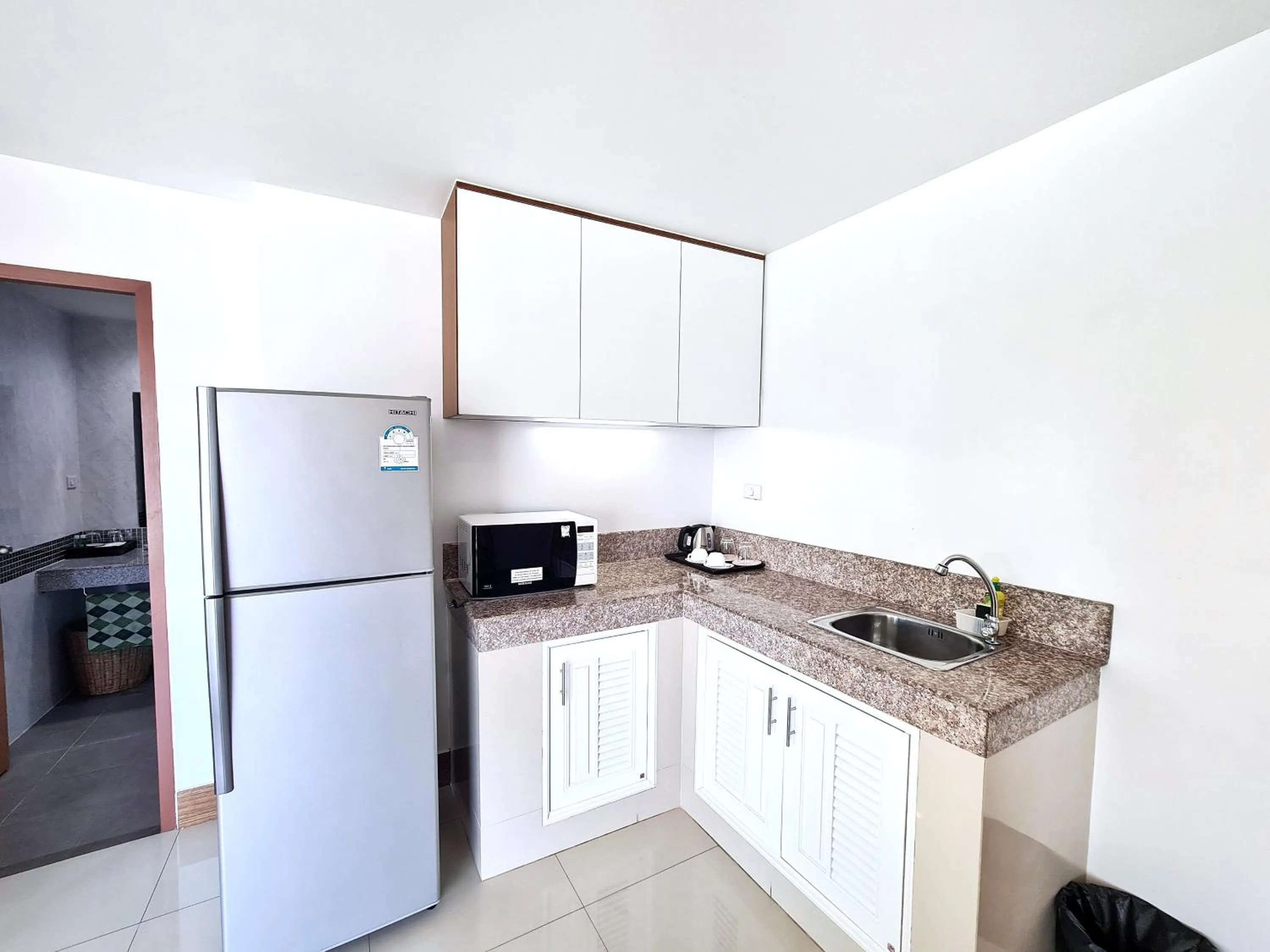 Kitchen or kitchenette in Nanthana Villa